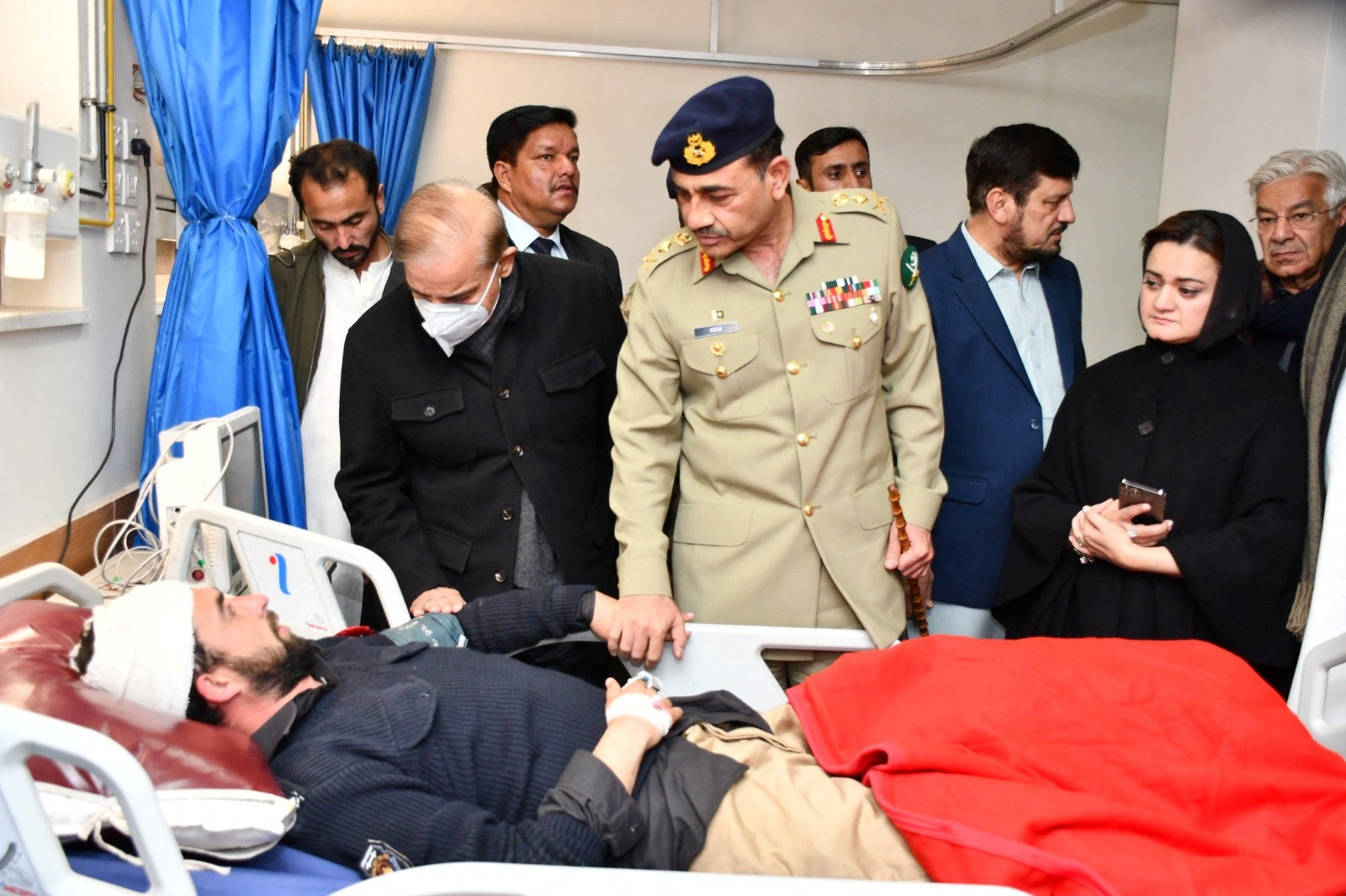 Chief of Army Staff (COAS) of Pakistan Asim Munir and Pakistan's prime minister Shehbaz Sharif visit a hospital to see those injured in bombing