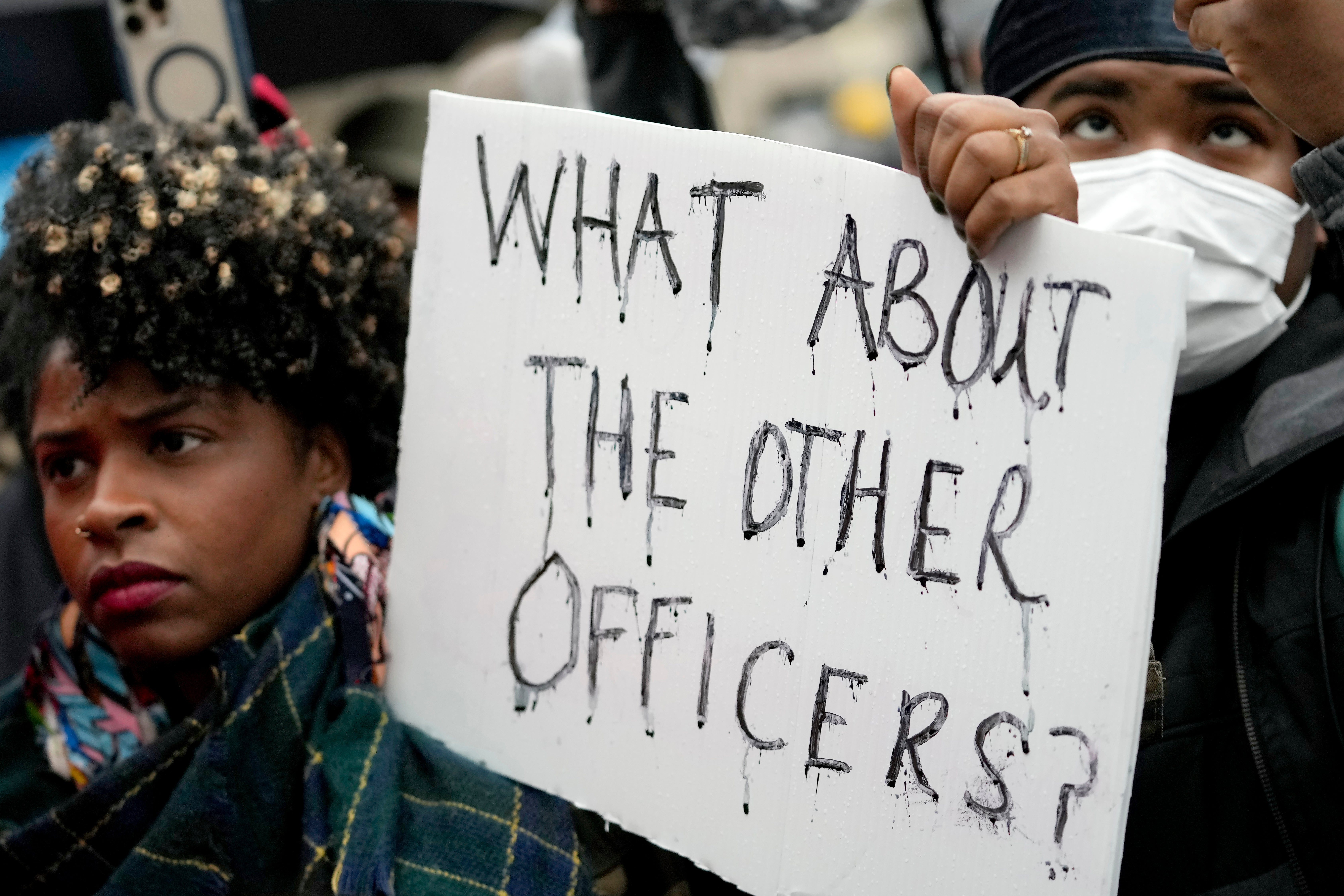 Protesters march in Memphis, Tennessee, over the death of Tyre Nichols, who died after being beaten by police during a traffic stop