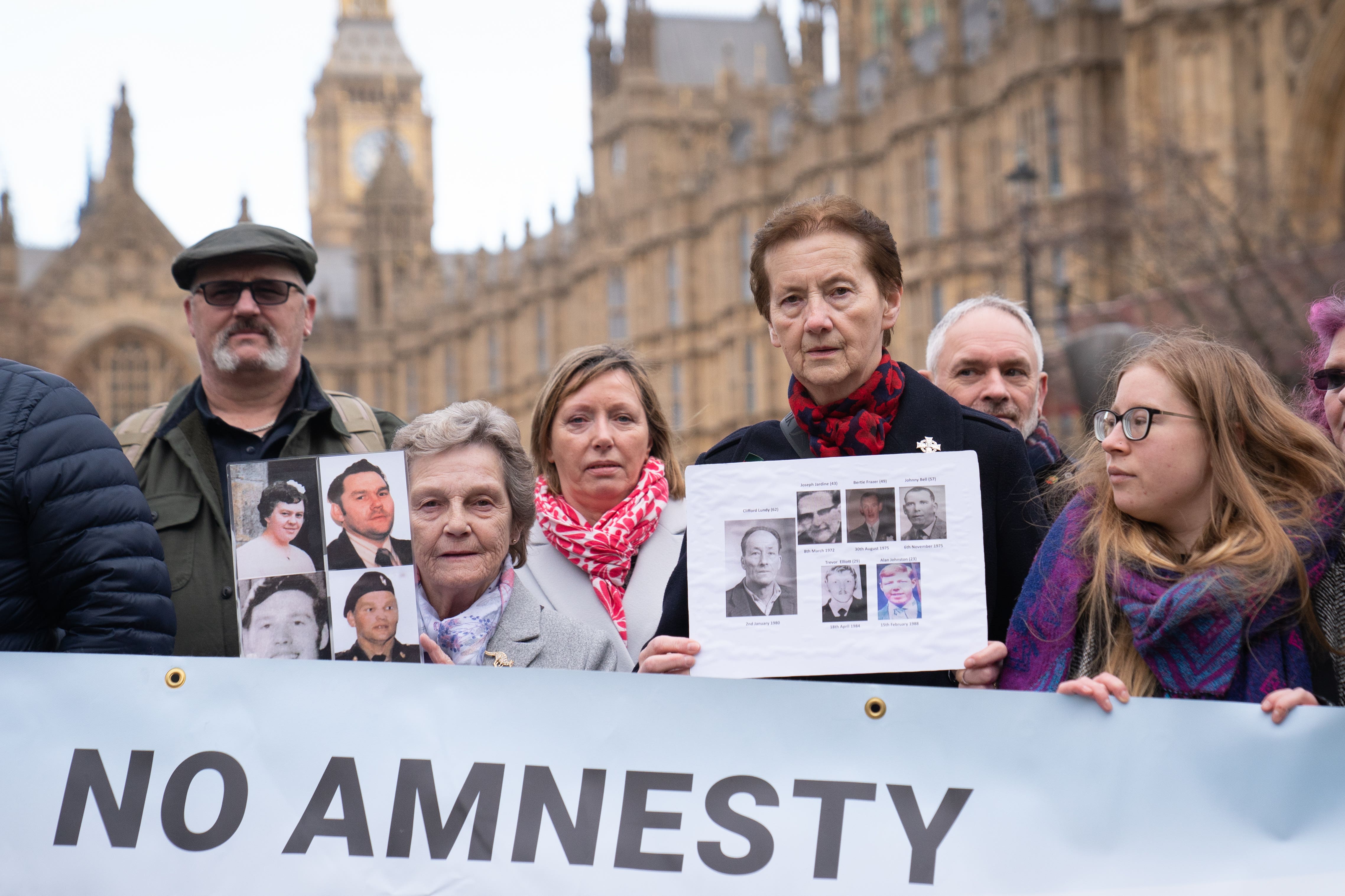 Members of the victims’ group South East Fermanagh Foundation demonstrate outside the Houses Of Parliament in Westminster before meeting with members of The House of Lords as the second reading of the Northern Ireland Troubles (Legacy and Reconciliation) Bill proceeds (Stefan Rousseau/PA)