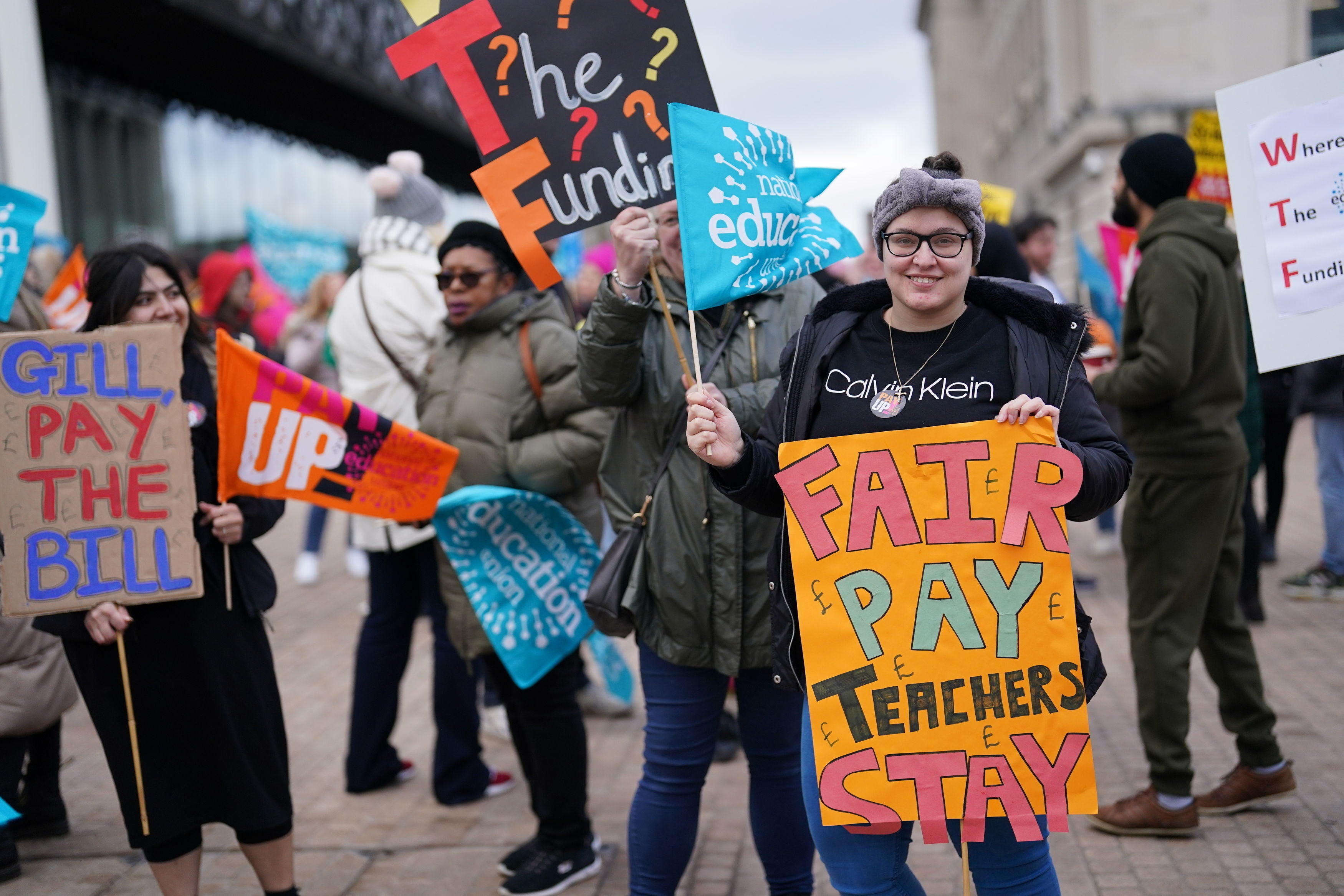 Protesters from the National Education Union (NEU), Trades Union Congress (TUC), Public and Commercial Services (PCS), and University and College Union (UCU), gather at the the National Strike Action Rally in Birmingham