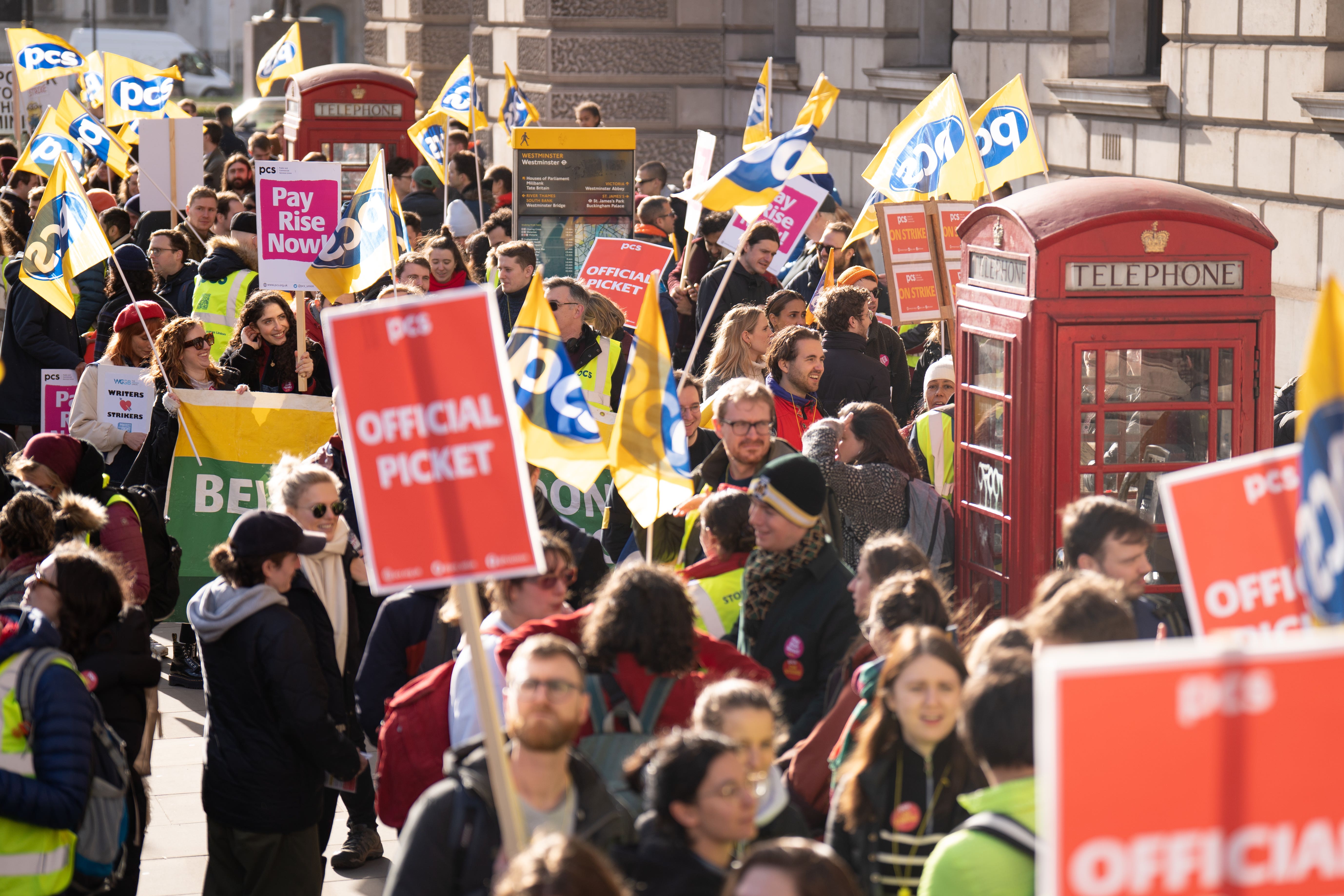 Members of the Public and Commercial Services Union on the picket line in Whitehall, London. Around 100,000 civil servants from 124 government departments, the Border Force, museums and other government agencies are on strike in a dispute over jobs, pay and conditions (PA)