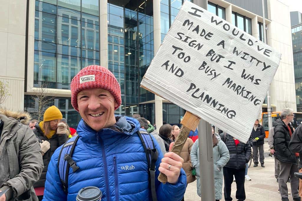 Year 6 primary school teacher Lewis Miles joins protesters as they gather at a TUC rally in central Cardiff (Bronwen Weatherby/PA)