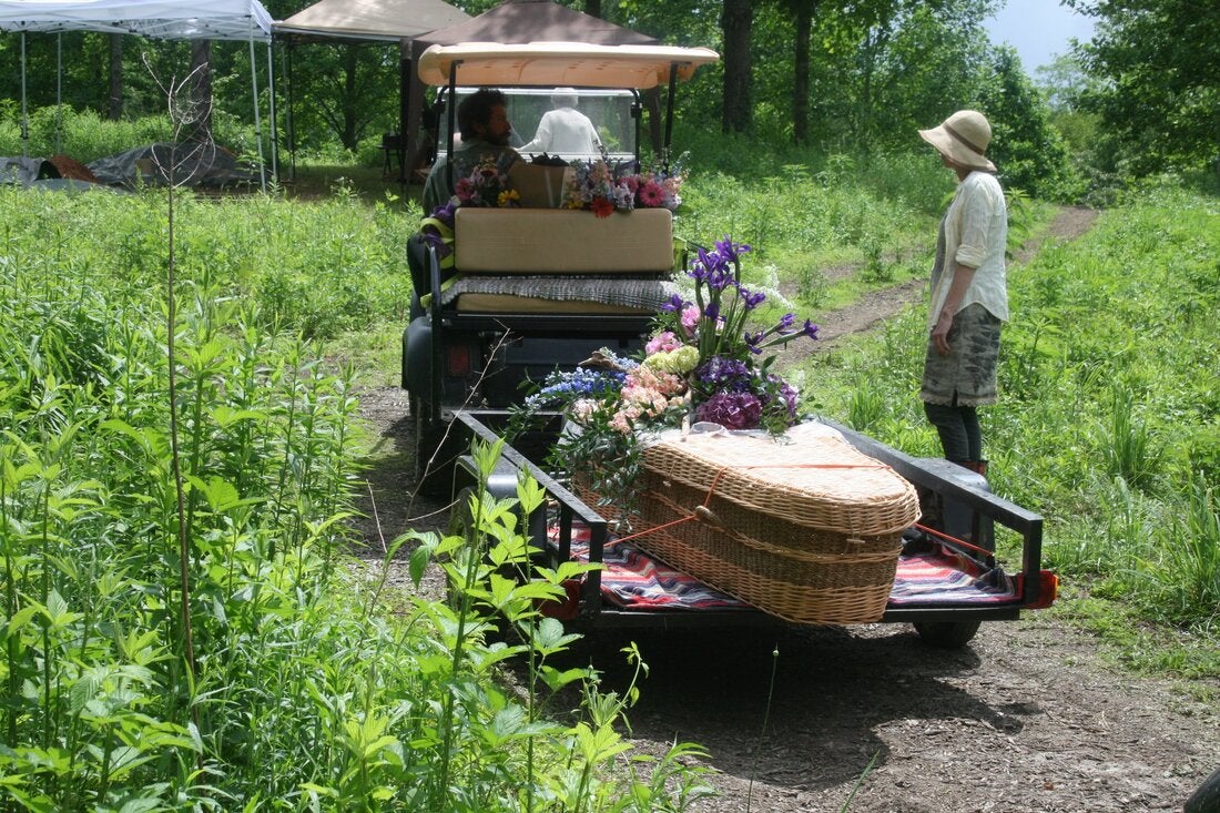 A biodegradable casket is taken for burial at the Carolina Memorial Sanctuary in Mills River, North Carolina
