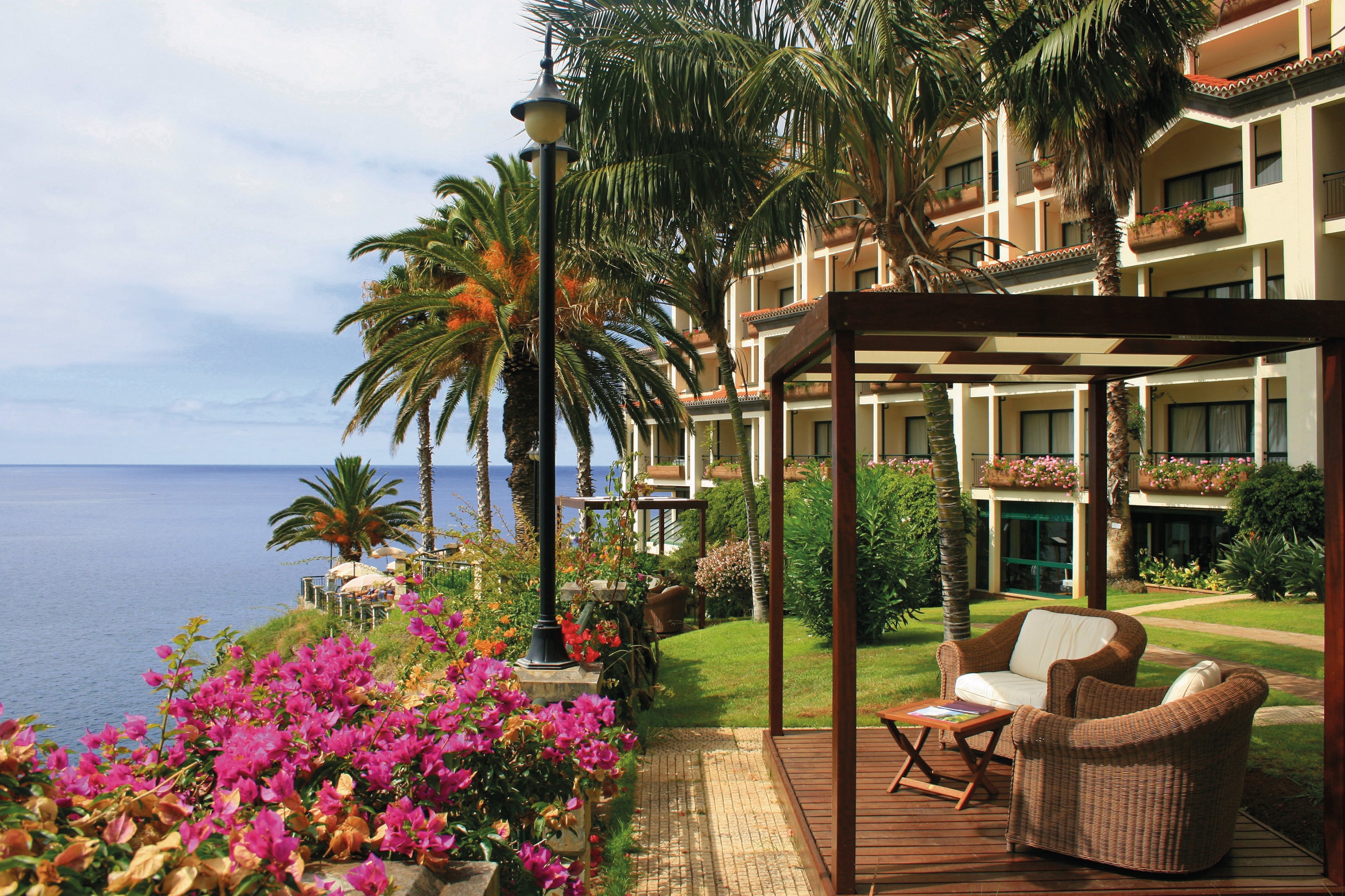 Enjoy an ocean-facing spa and two-Michelin star fare at The Cliff Bay Hotel