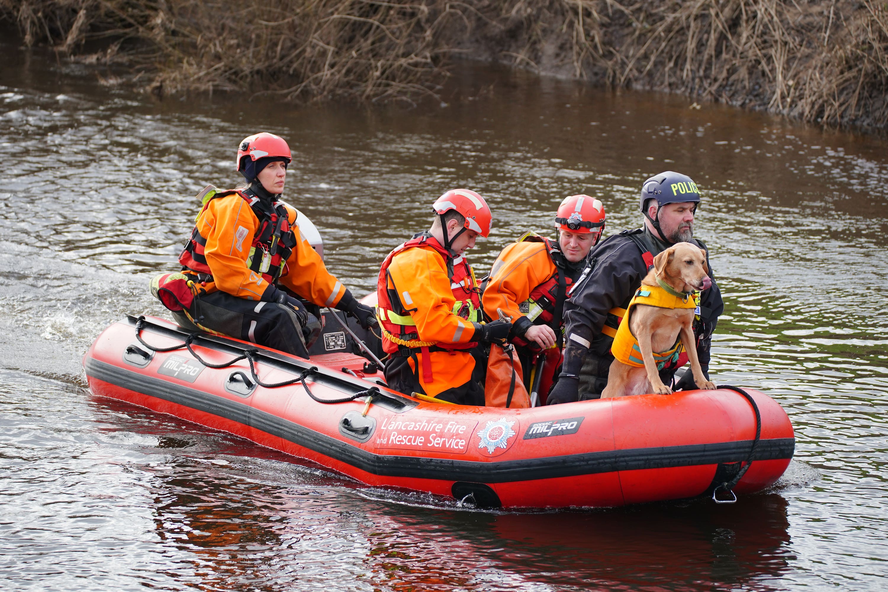 Specialist search teams from Lancashire Fire and Rescue Service and the police, on the River Wyre, in St Michael’s on Wyre, Lancashire (Peter Byrne/PA)