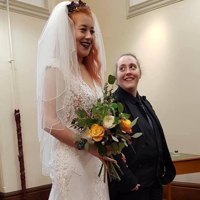 Jordan Del’Nero (left) on her wedding day to wife Amy