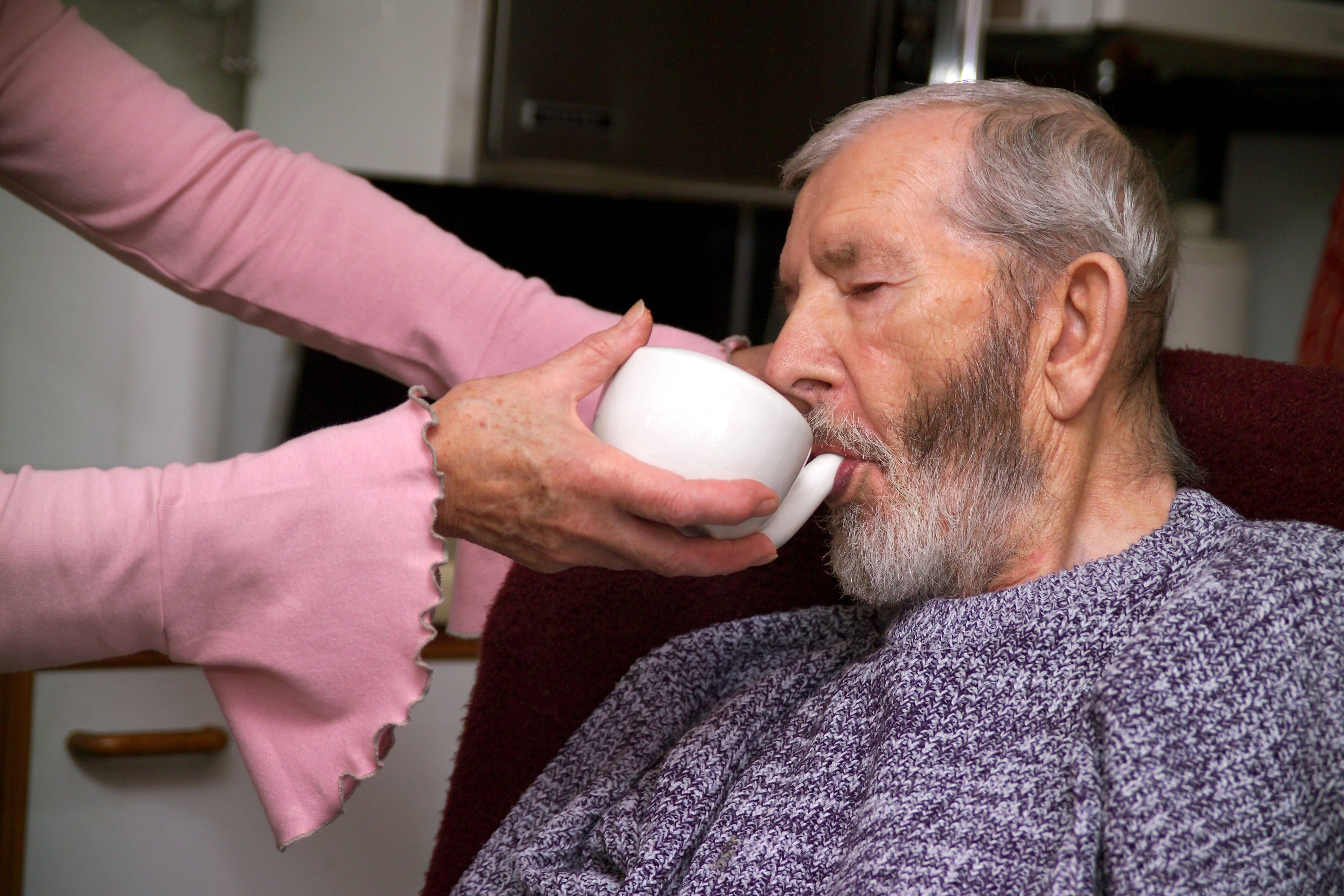 Unpaid carers taking leave from their jobs should be a normal part of working life, like taking a sick day or maternity leave after a baby, ministers have heard (Alamy/PA)