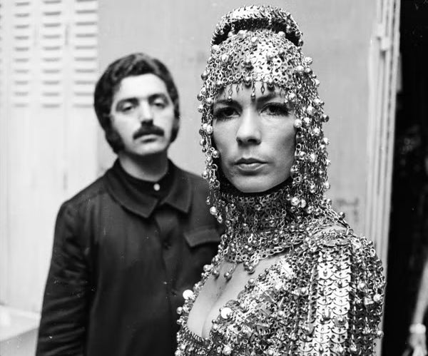 Rabanne with model Isabel Feldel, who is wearing one of his elaborate metallic creations, in 1967