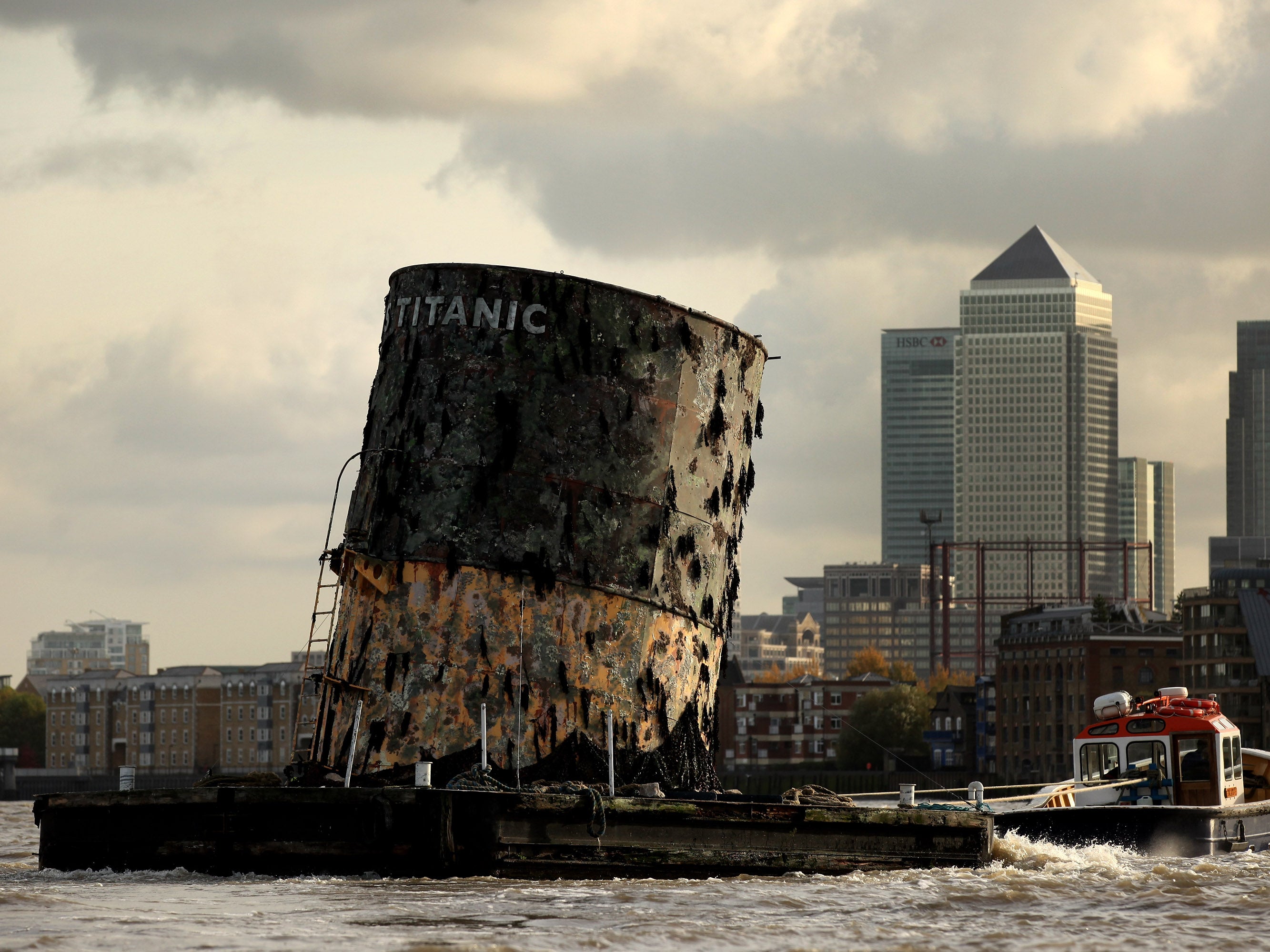 A replica of the Titanic’s fourth funnel is towed along the River Thames in 2010, to launch an exhibition of artefacts at the O2 Bubble