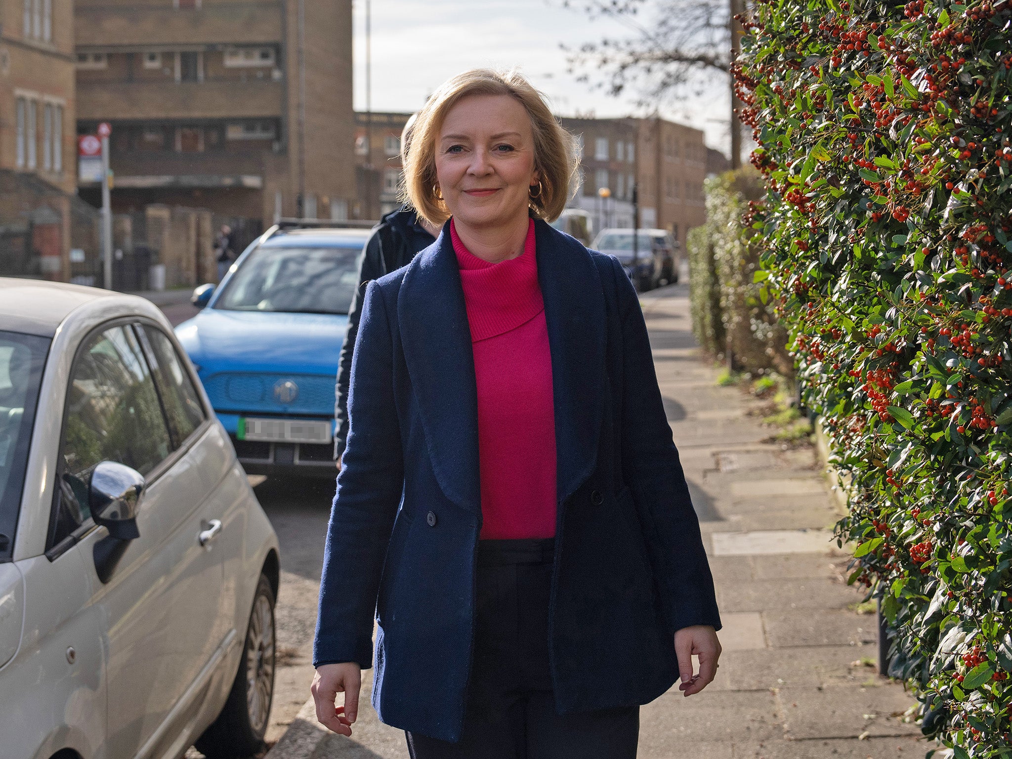 Liz Truss outside her home on Sunday