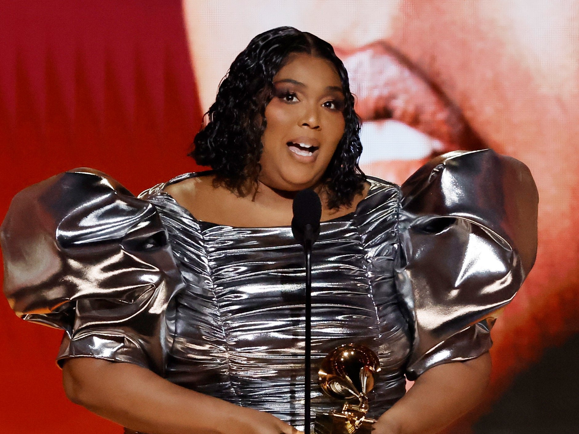 Lizzo accepts the Record Of The Year award for “About Damn Time”