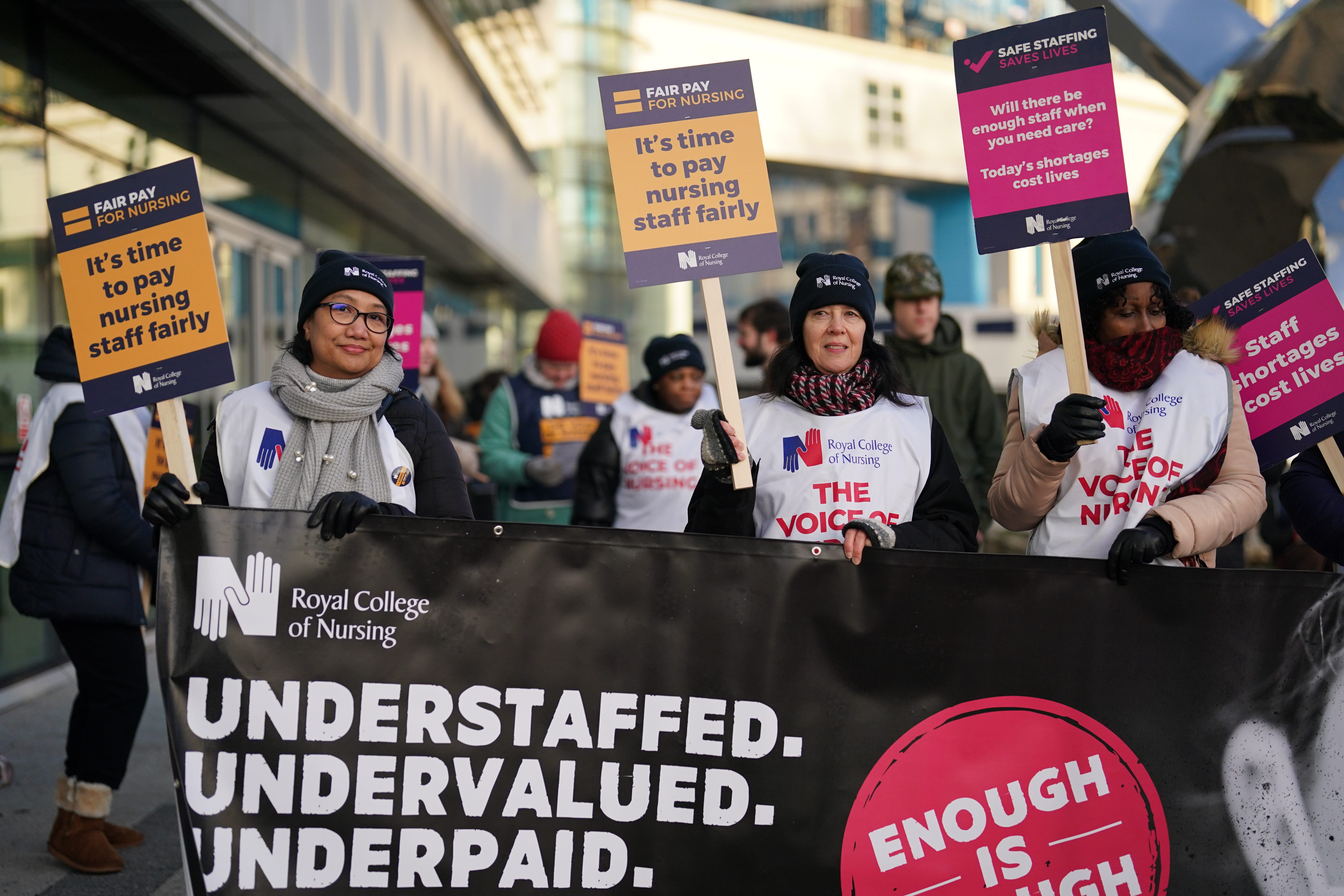 Workers on the picket line outside Queen Elizabeth hospital in Birmingham (Jacob King/PA)