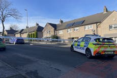Three children stabbed at home as woman arrested on suspicion of attempted murder