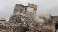 Damaged building in Aleppo collapses during earthquake aftershock