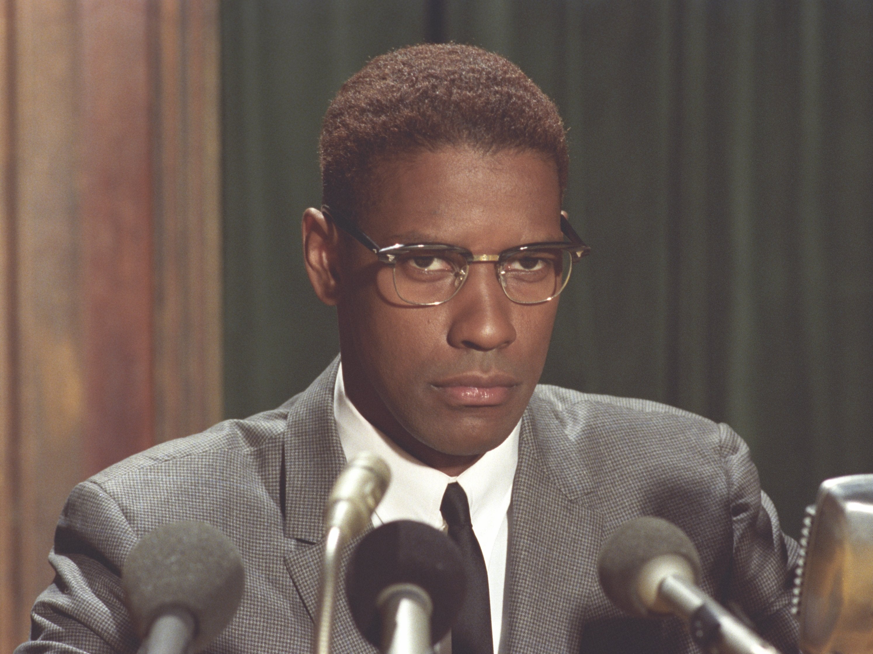 Denzel Washington as Malcolm X