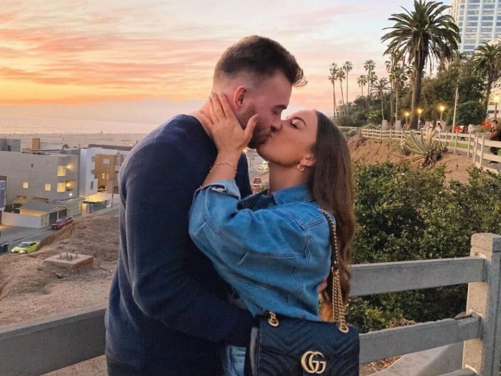 Hailie Jade kisses her fiancee Evan McClintock