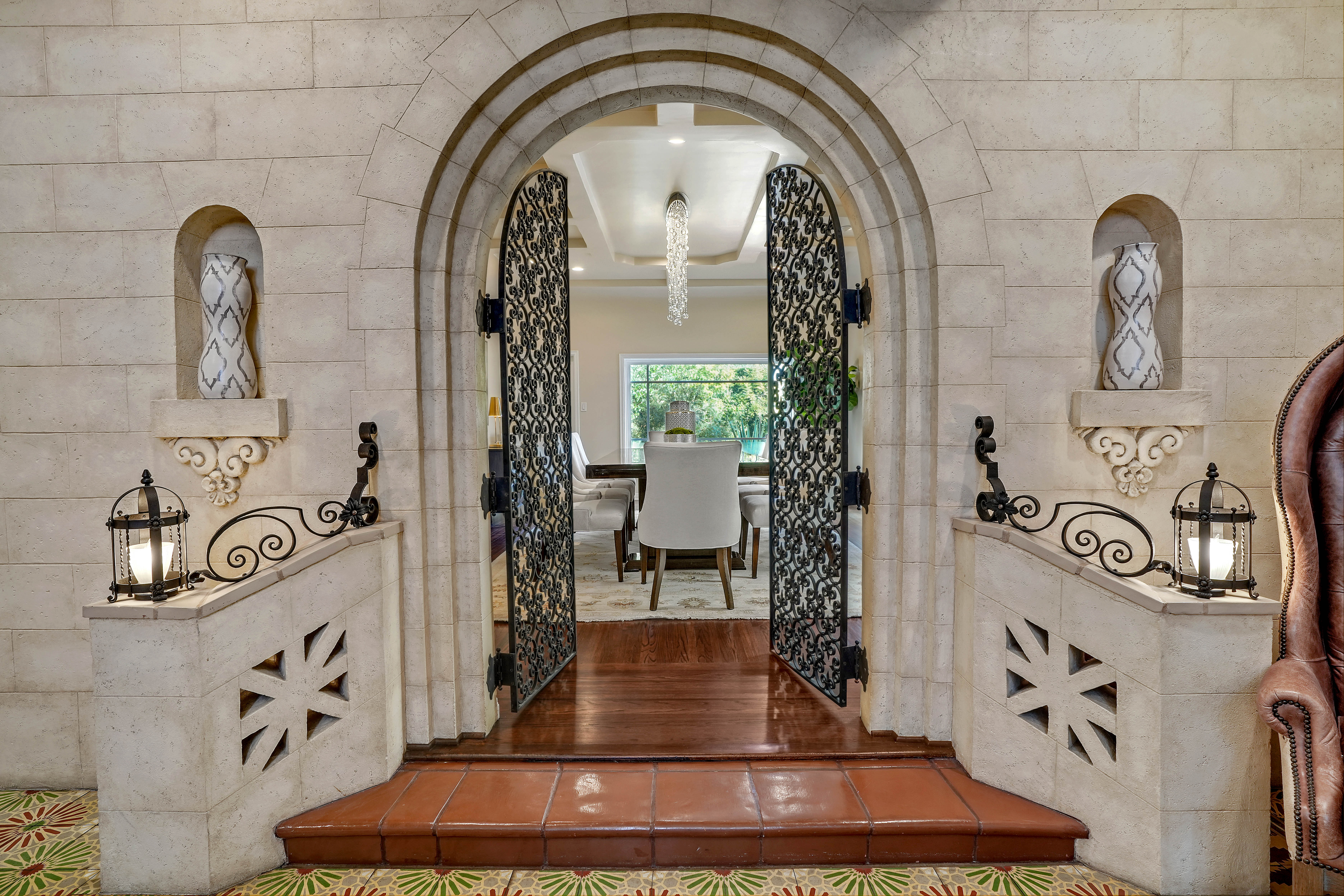 The residence, built in 1928 and meticulously maintained, features intricate stonework, a gorgeous facade, and a tower reminiscent of a castle