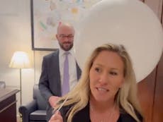 Marjorie Taylor Greene tries to troll Biden administration by towing large balloon before State of the Union