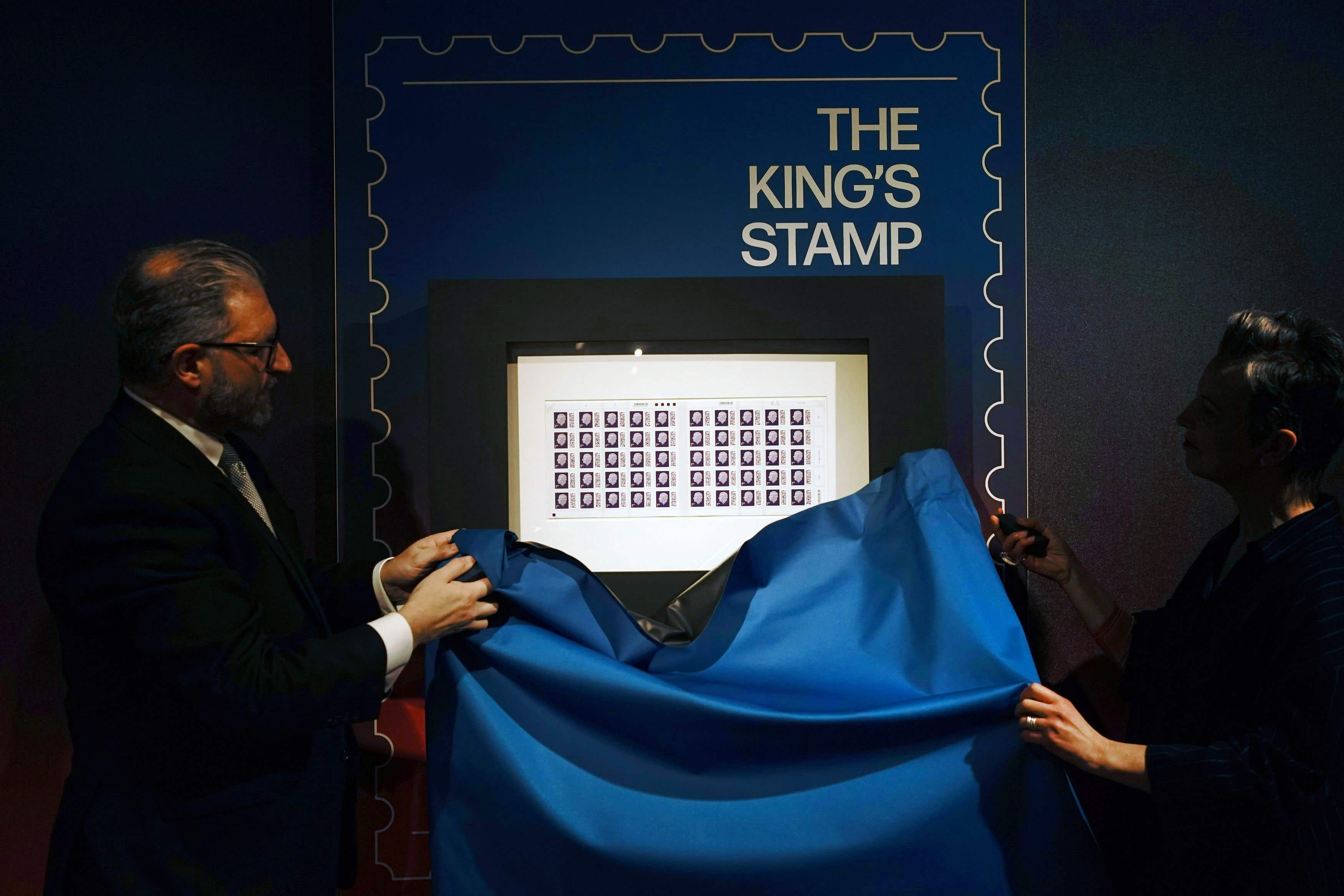 One of the first sheets of the 1st class definitive stamp featuring King Charles III is unveiled as it goes on display at the Postal Museum in central London, before they enter circulation later this year (Victoria Jones/PA)