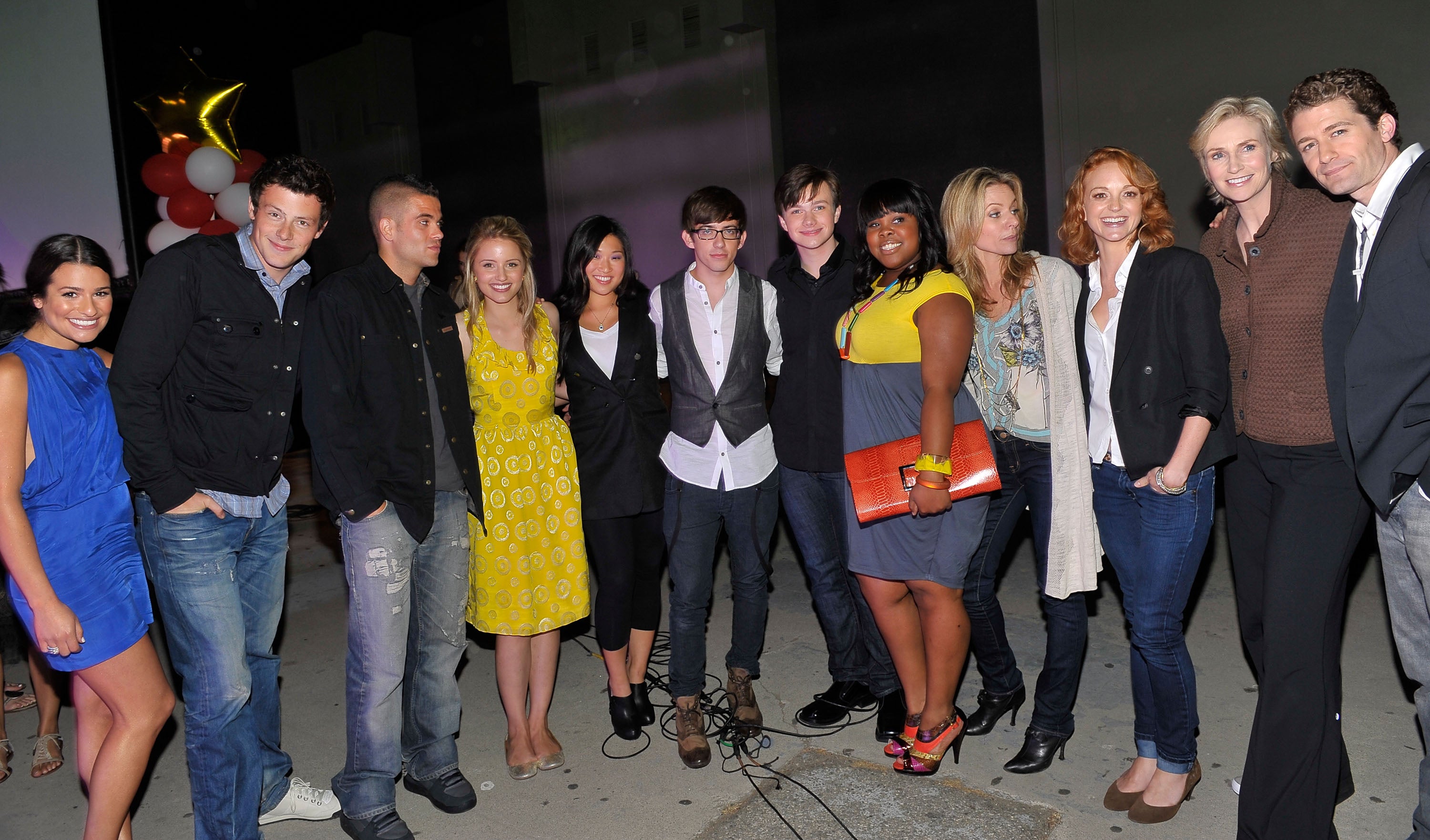 Michele (far left) with the cast of ‘Glee’ in 2009