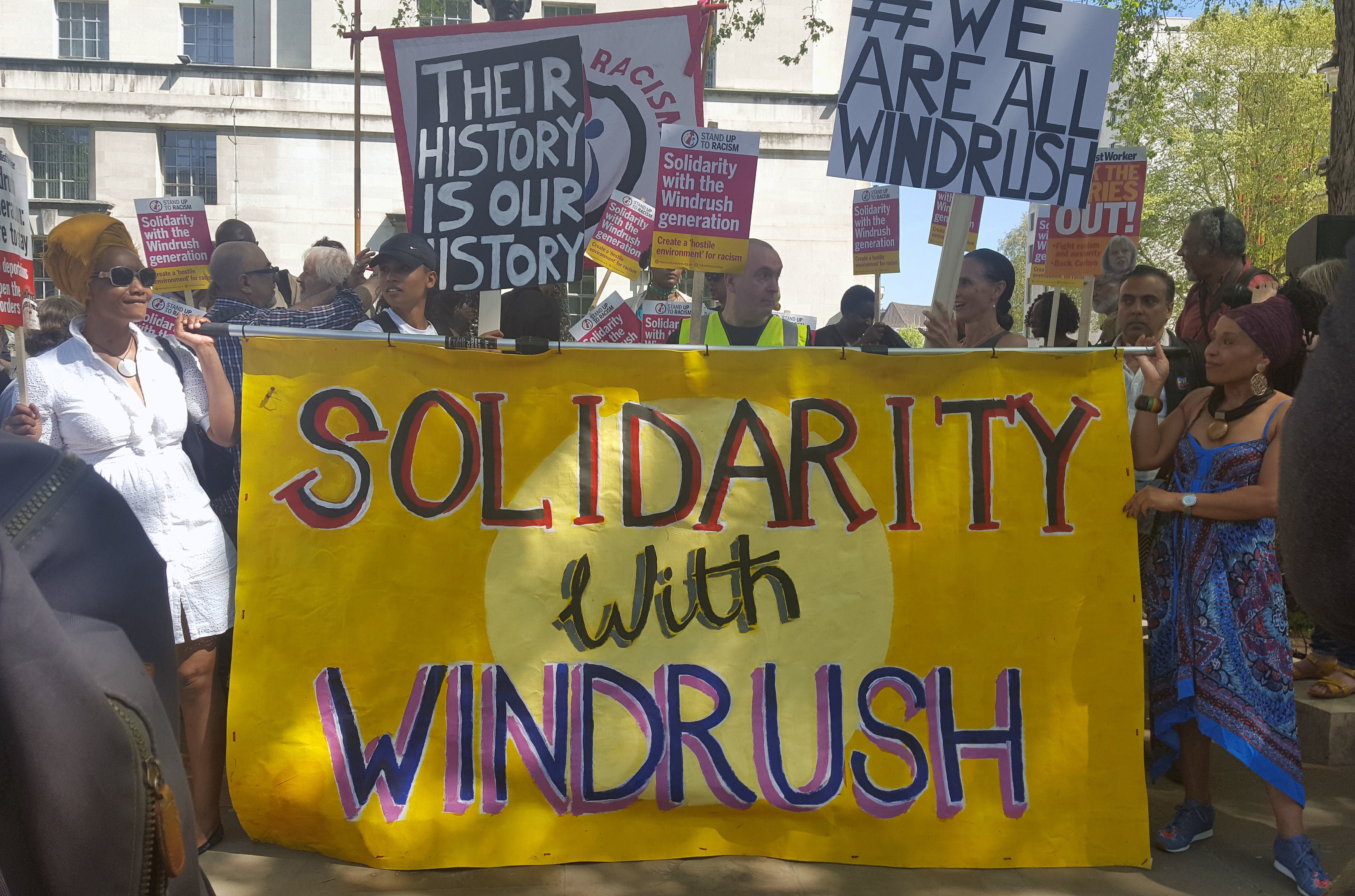 Members of campaign group Stand Up To Racism during a demonstration on Whitehall