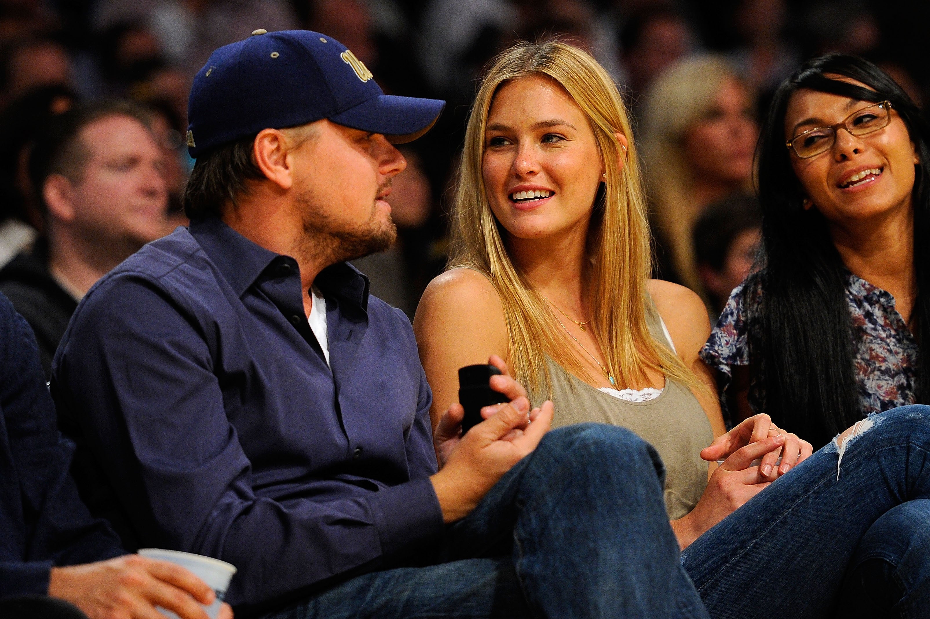 Leonardo DiCaprio and girlfriend model Bar Refaeli sit courtside during Game Two of the Western Conference Quarterfinals of the 2010 NBA Playoffs