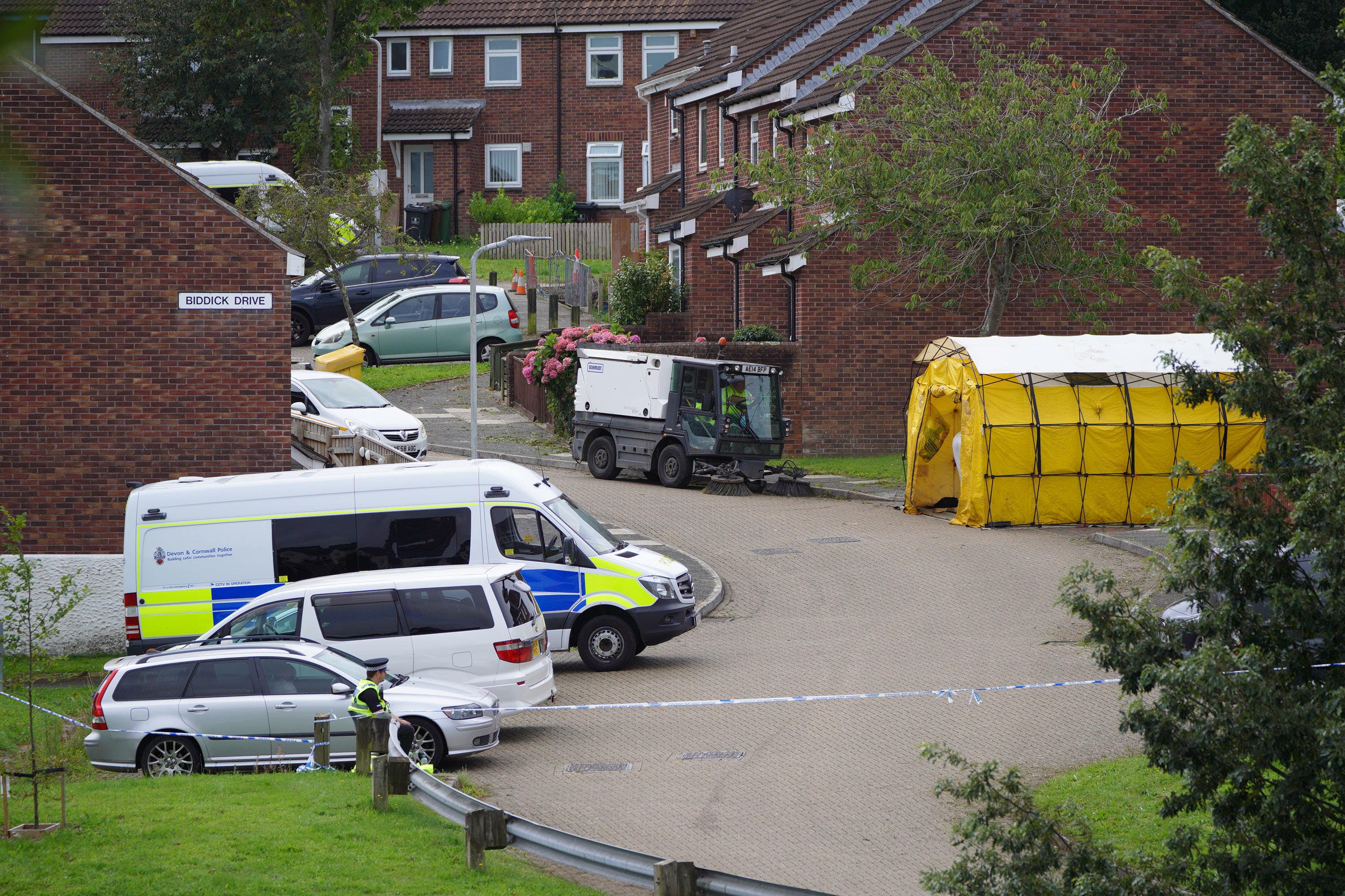 File photo dated 15/8/2021 of a street cleaner in Biddick Drive in the Keyham area of Plymouth, Devon, where five people were killed by gunman Jake Davison in a firearms incident. Inquests are to resume into the deaths of five people shot dead by Jake Davison in Plymouth. Davison, 22, killed his mother Maxine, 51, after a row and then shot dead four others in a 12-minute attack. Issue date: Tuesday January 17, 2023.