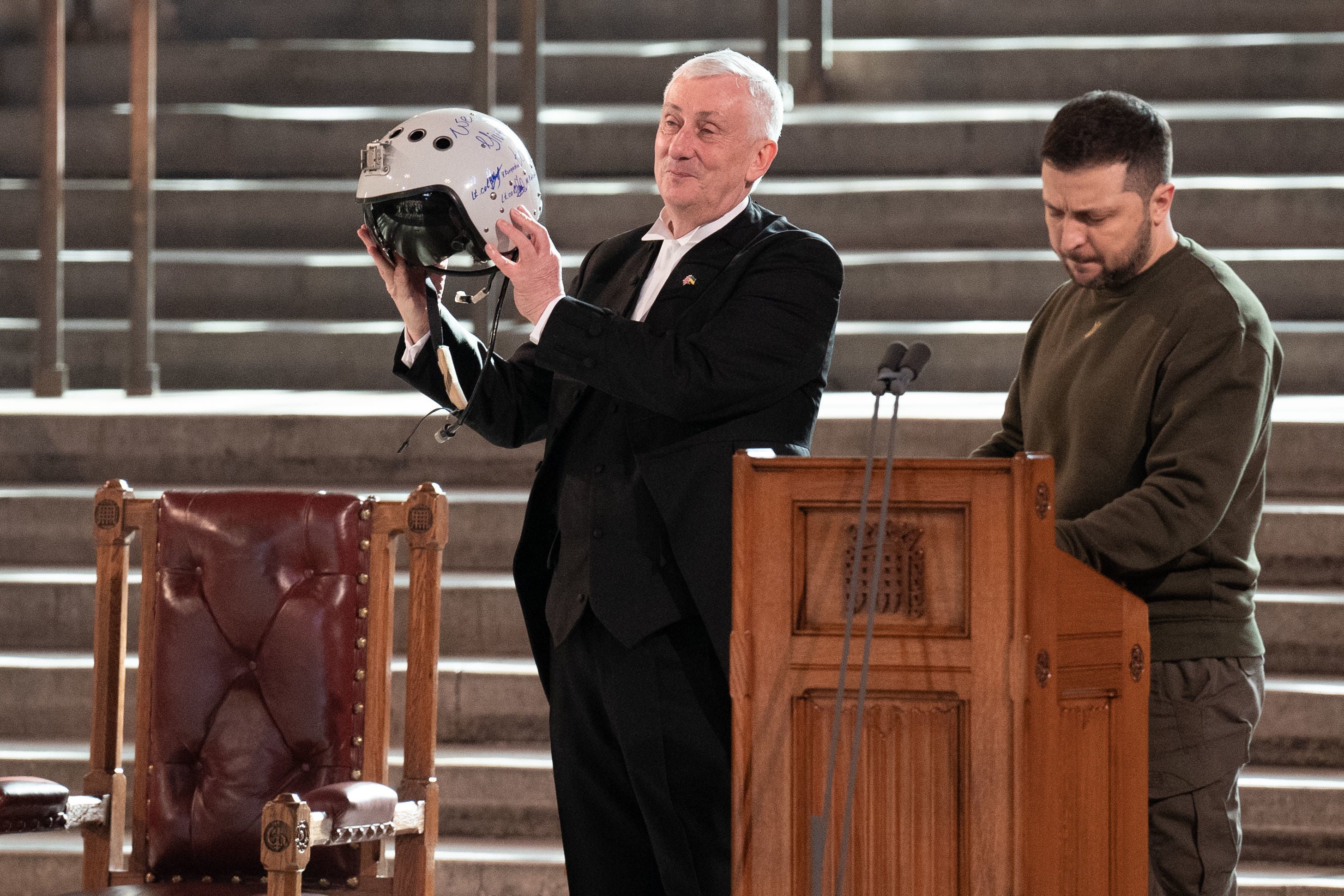 Speaker of the House of Commons, Sir Lindsay Hoyle (left), holds the helmet of one of the most successful Ukrainian pilots, inscribed with the words ‘We have freedom, give us wings to protect it’