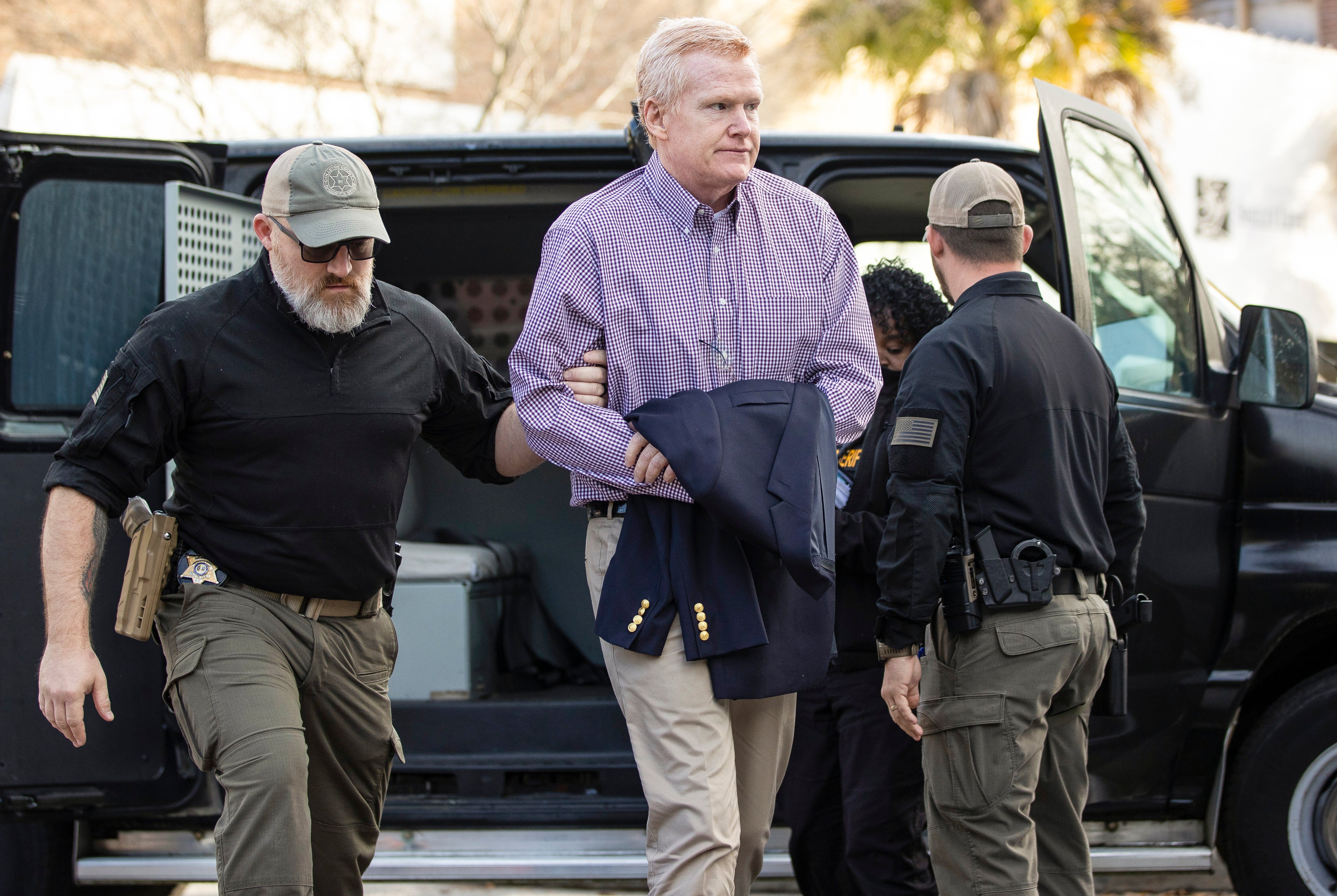 Alex Murdaugh walks into the courthouse before his double murder trial on Wednesday