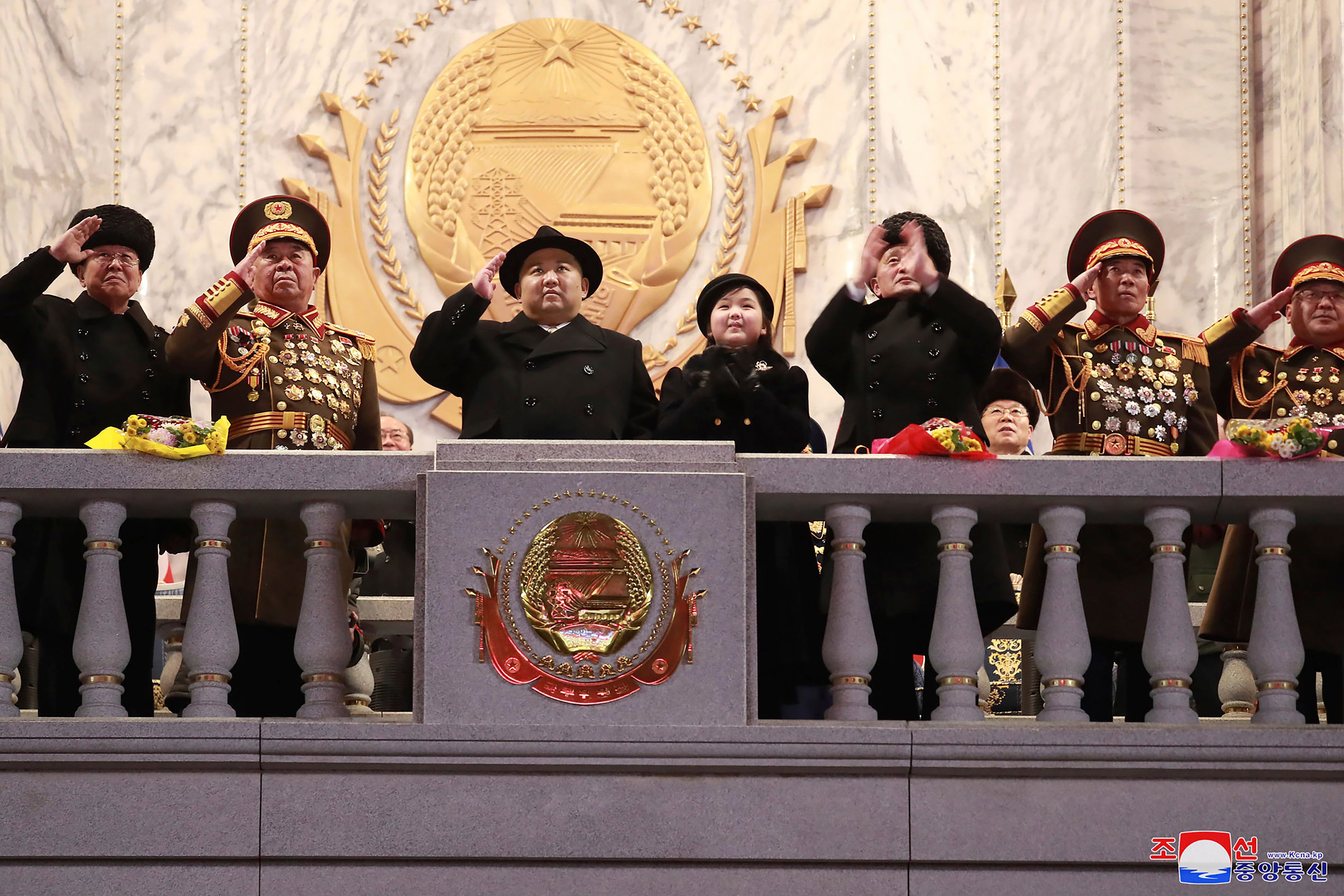 North Korean leader Kim Jong Un, third left, and his daughter attend a military parade to mark the 75th founding anniversary of the Korean People’s Army