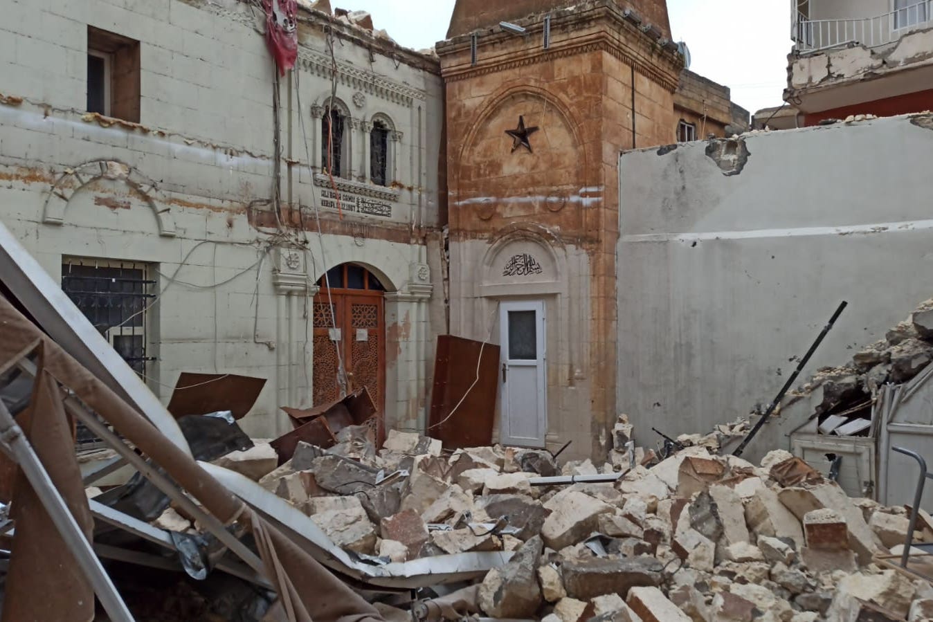 A collapsed building in Sanliurfa, Turkey, after the 7.8 magnitude earthquake (PA)