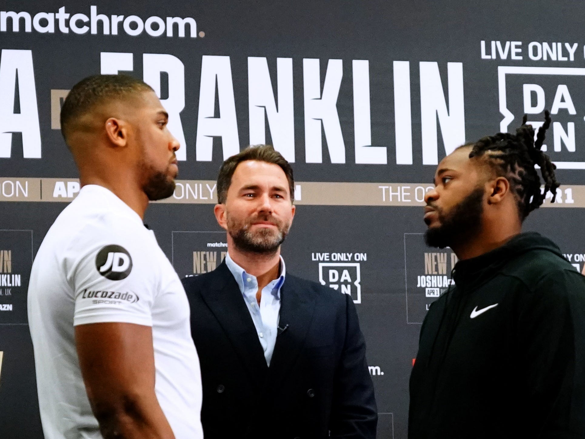 Anthony Joshua (left) with promoter Eddie Hearn (centre) and opponentJermaine Franklin