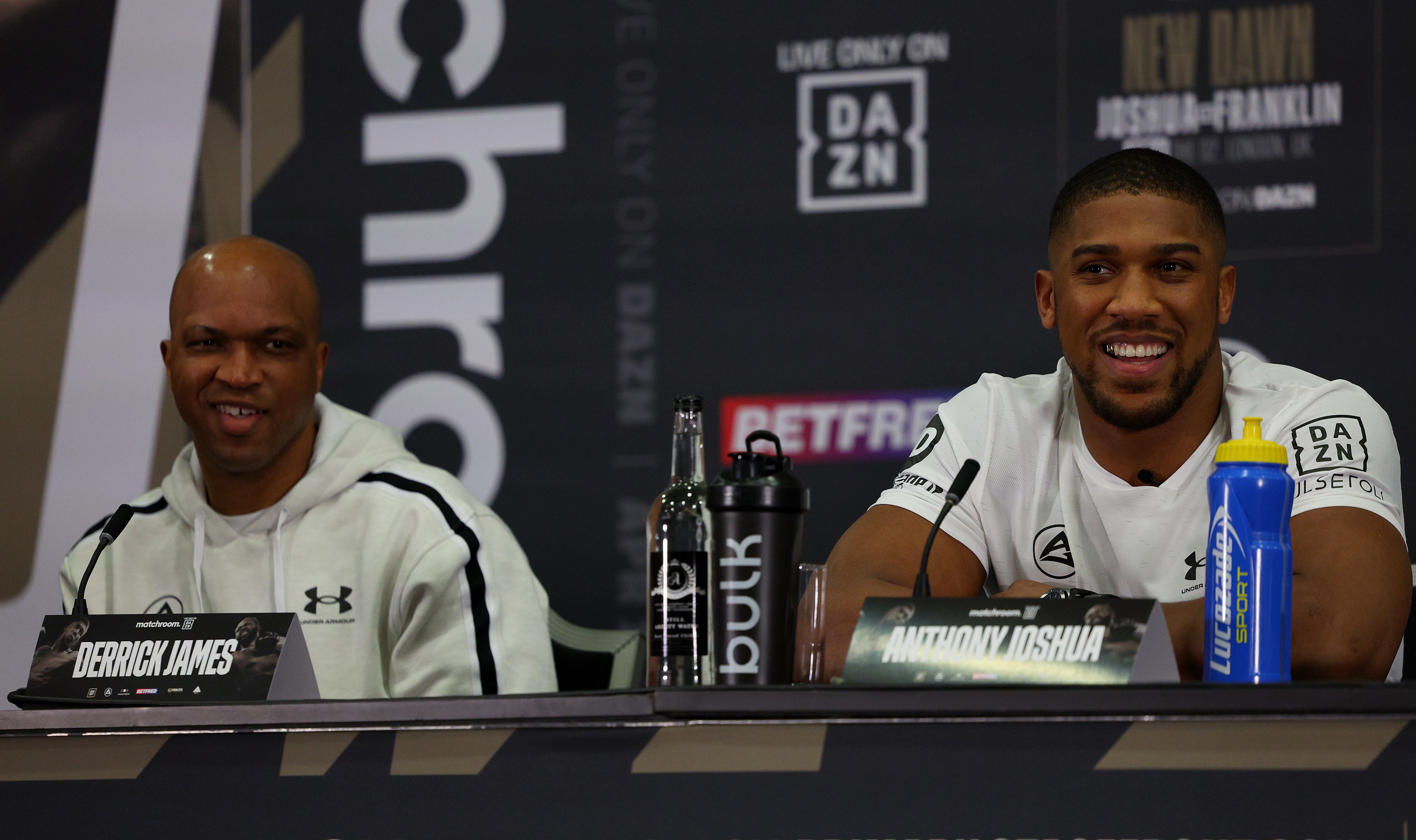 Joshua (right) with his new coach Derrick James