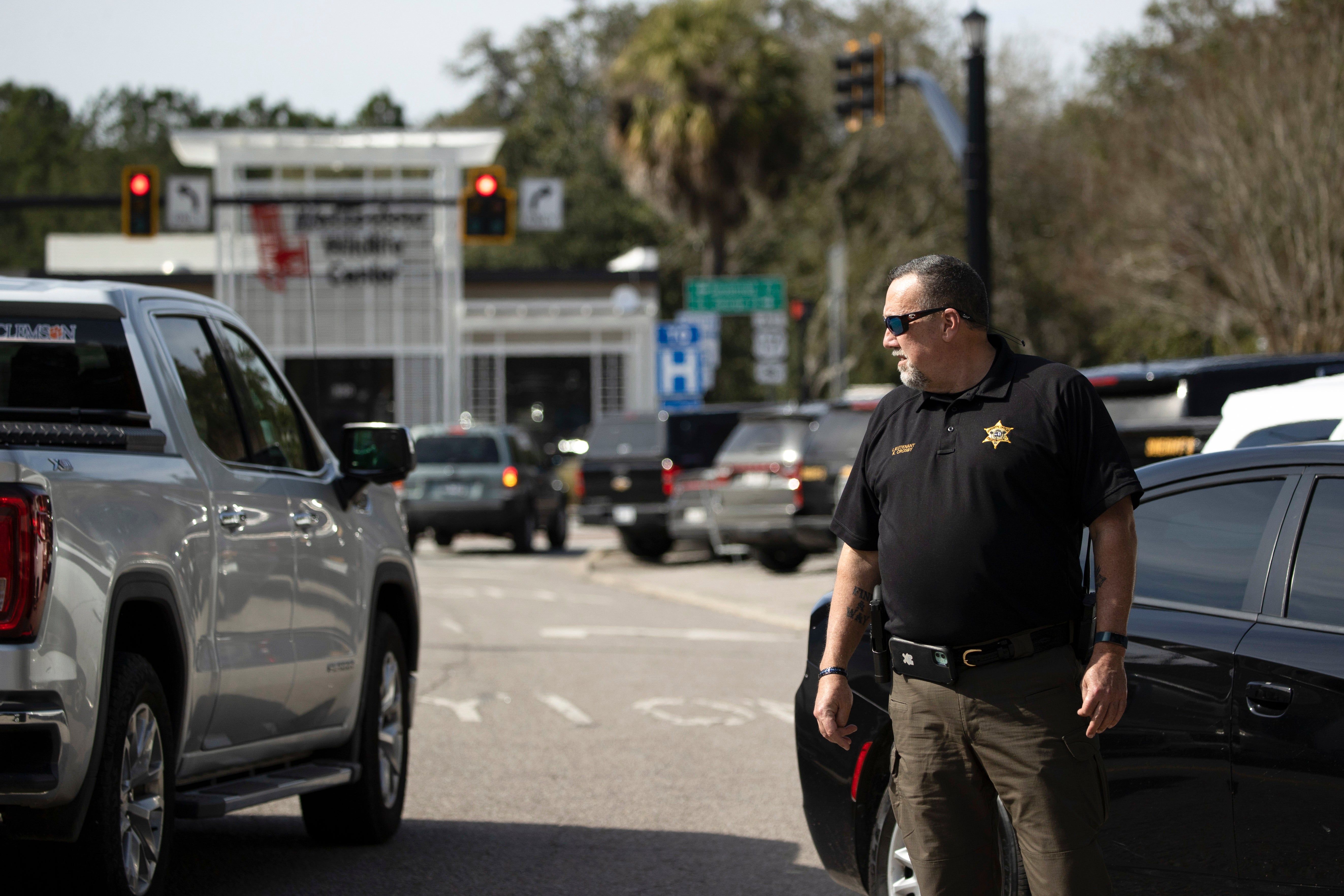 Police block off roads near the courthouse due to the bomb threat