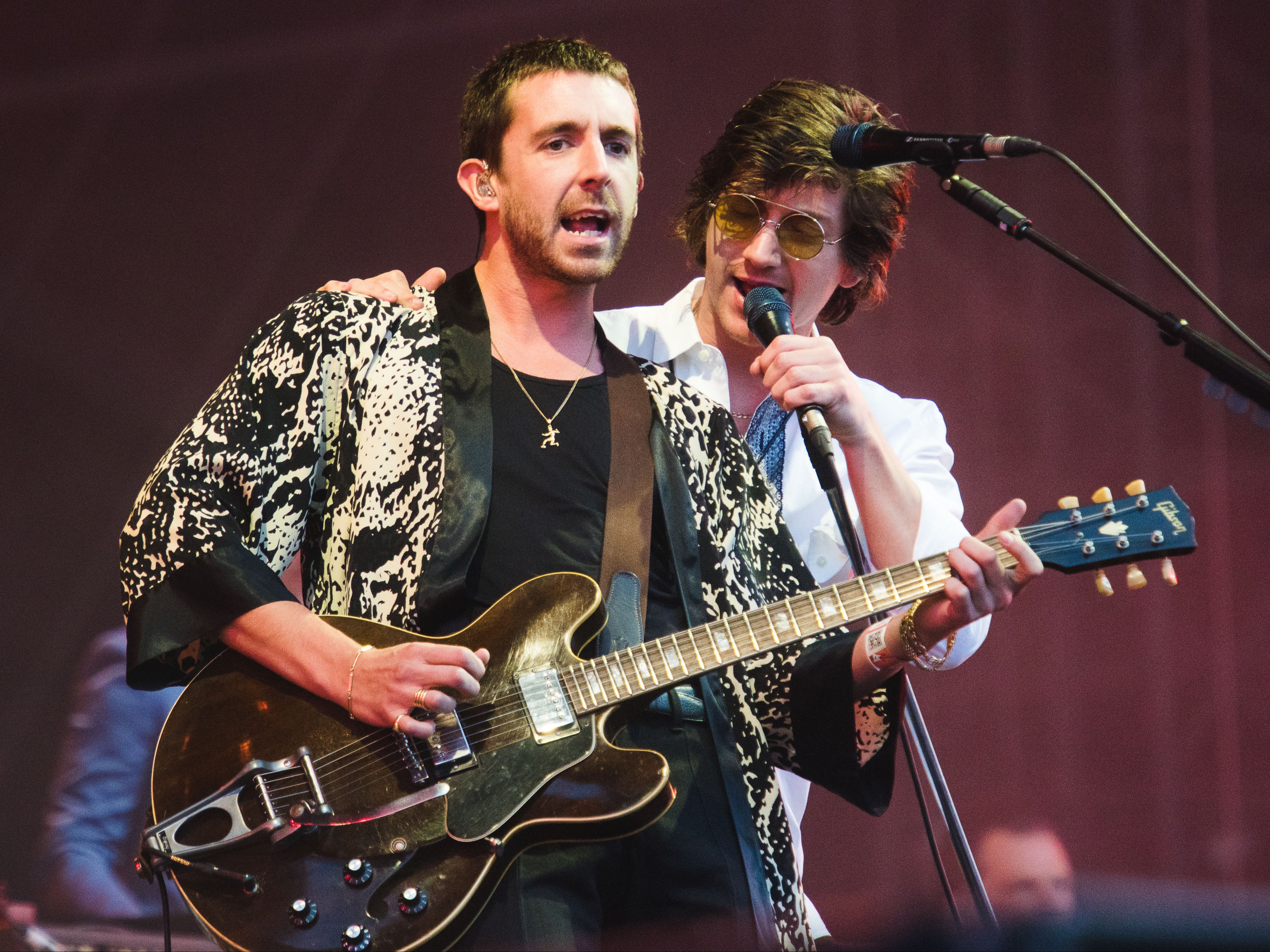 Alex Turner, left, and Miles Kane perform in Paris in 2016