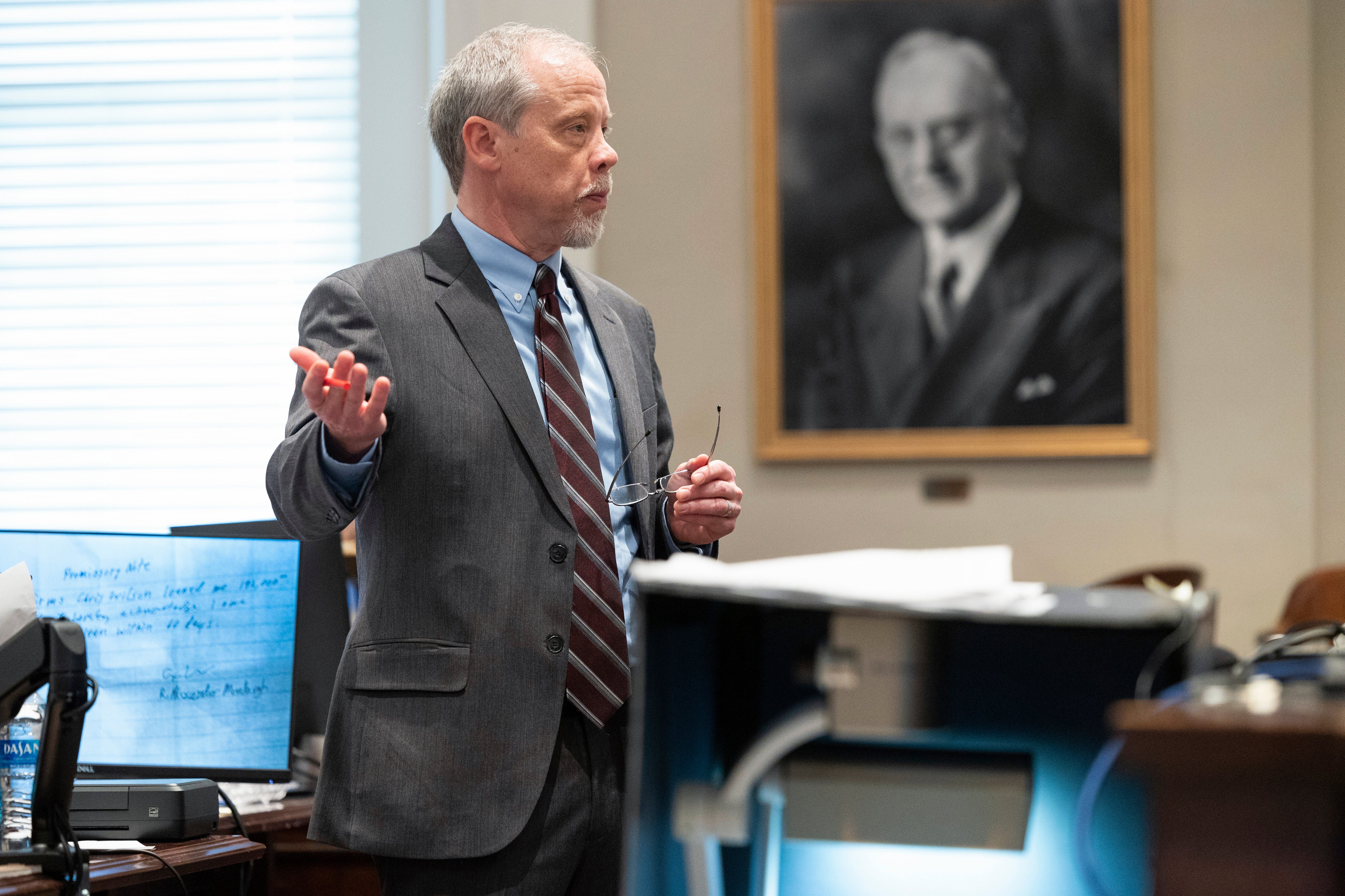 Prosecutor Creighton Waters questions witness Chris Wilson during the trial