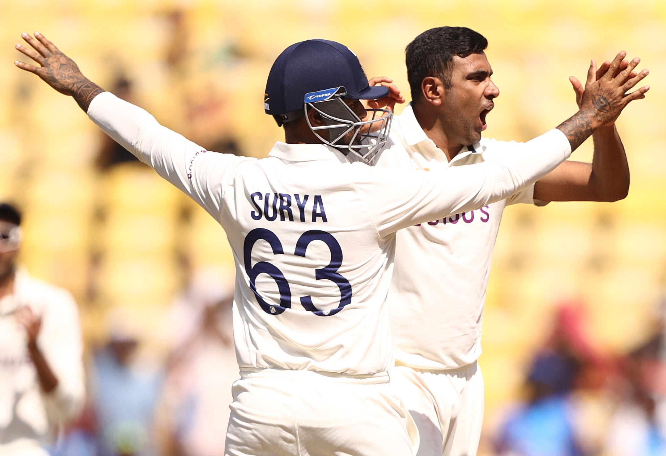 India celebrate after Ravi Ashwin takes the wicket of Matthew Renshaw