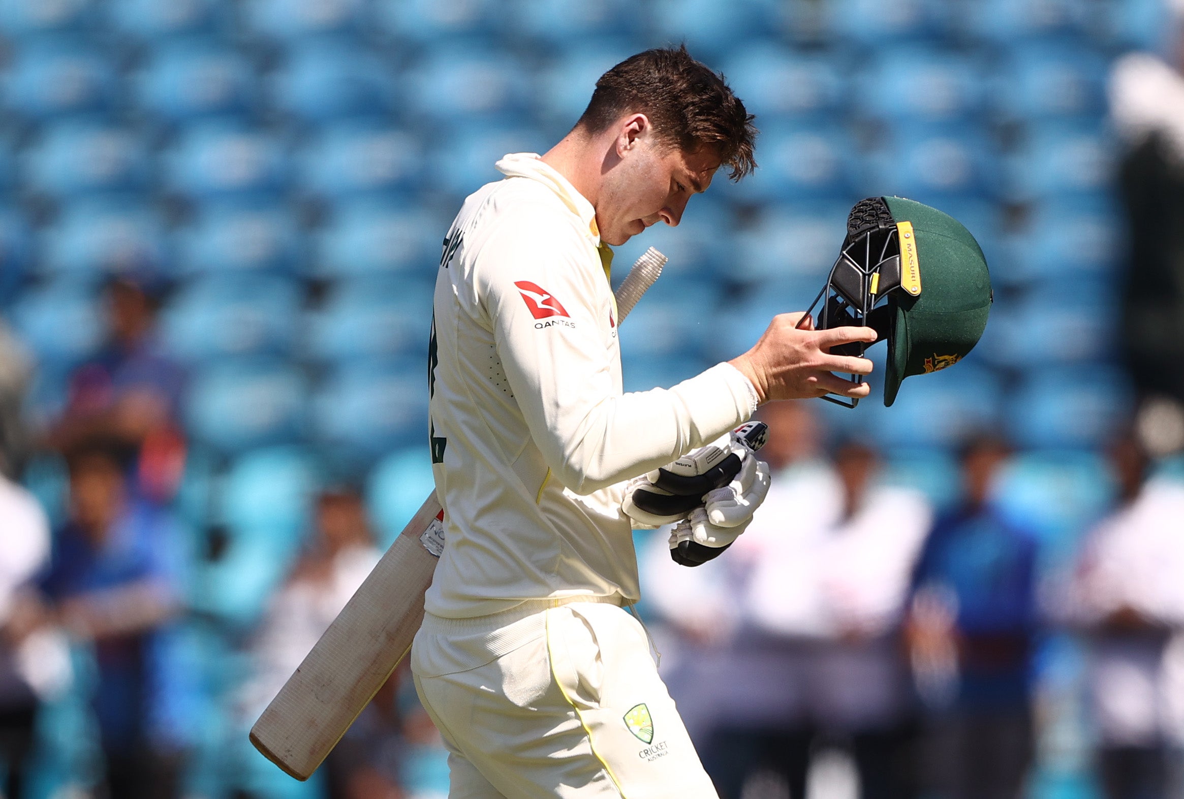 Matthew Renshaw of Australia walks off after he was dismissed by Ashwi