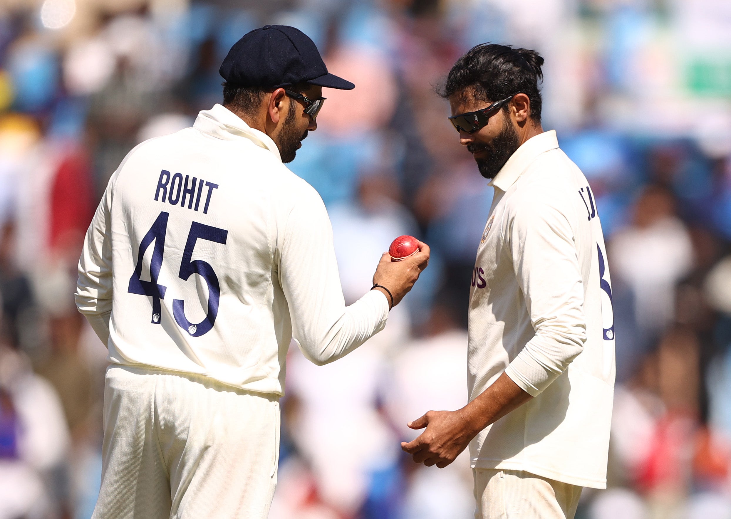 Rohit Sharma speaks with Ravindra Jadeja during day three of the first Test