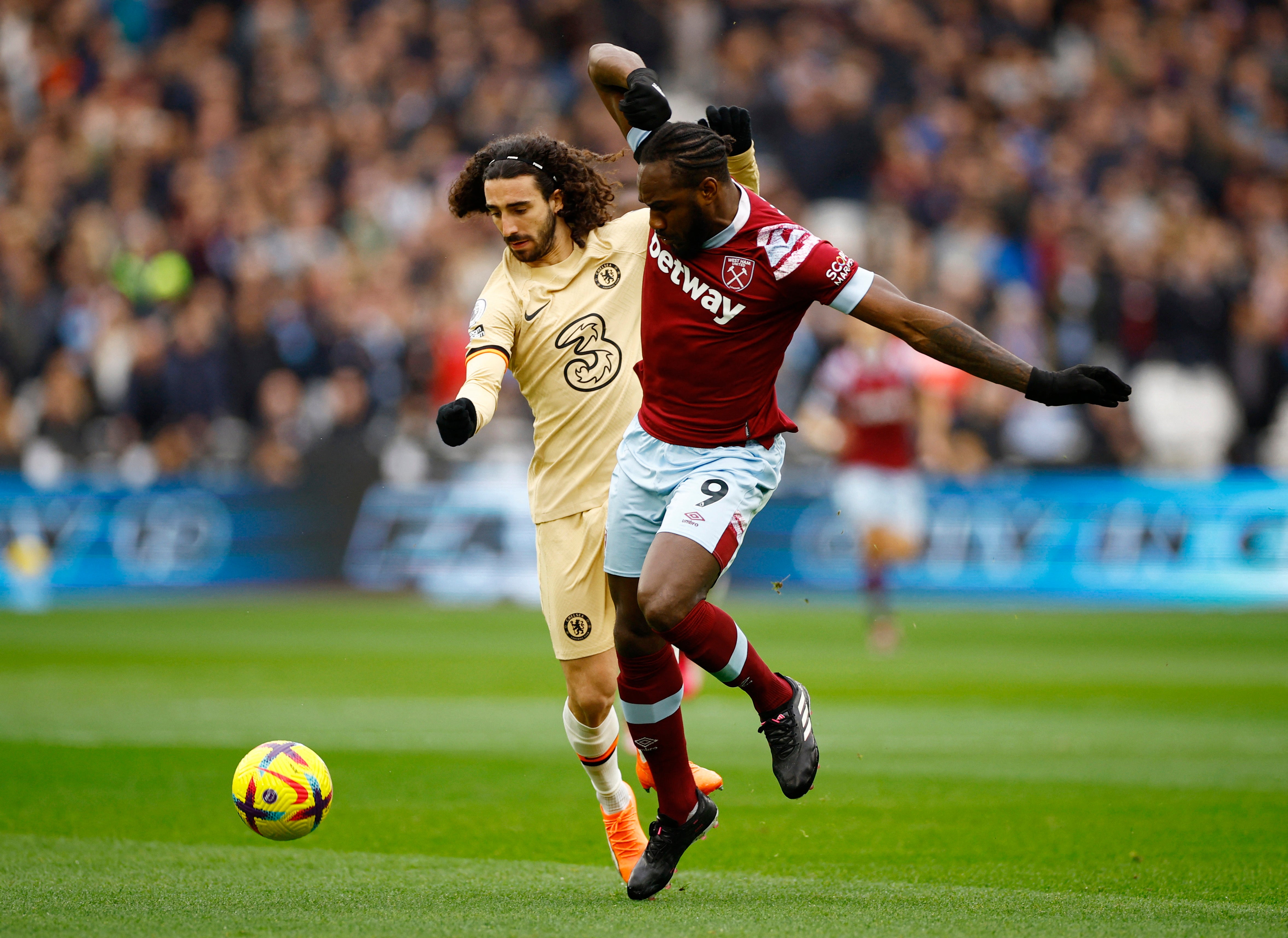 Marc Cucurella battles with Michael Antonio for the ball