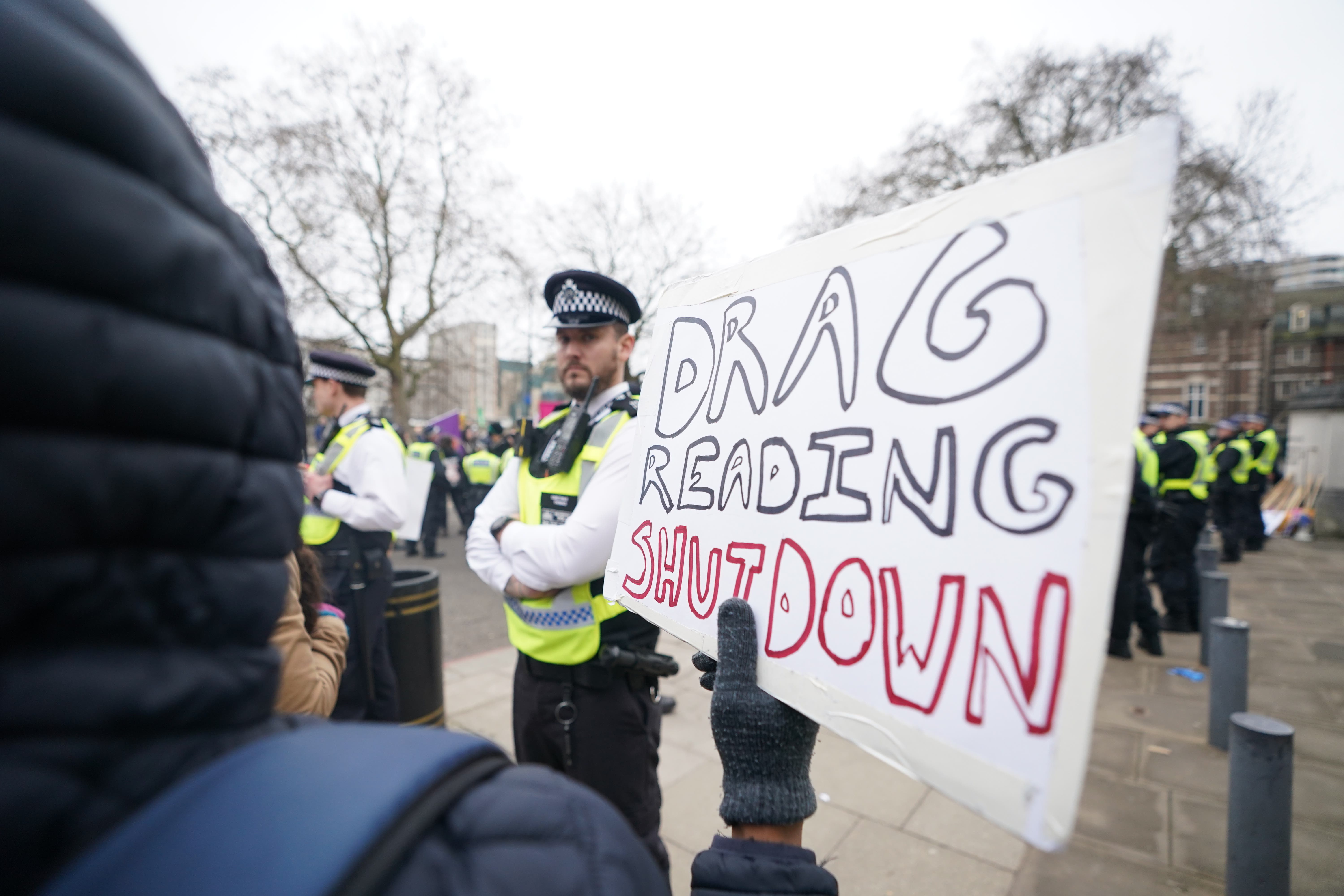 A protester outside the Tate Britain, which was hosting a Drag Queen Story Hour in 2023