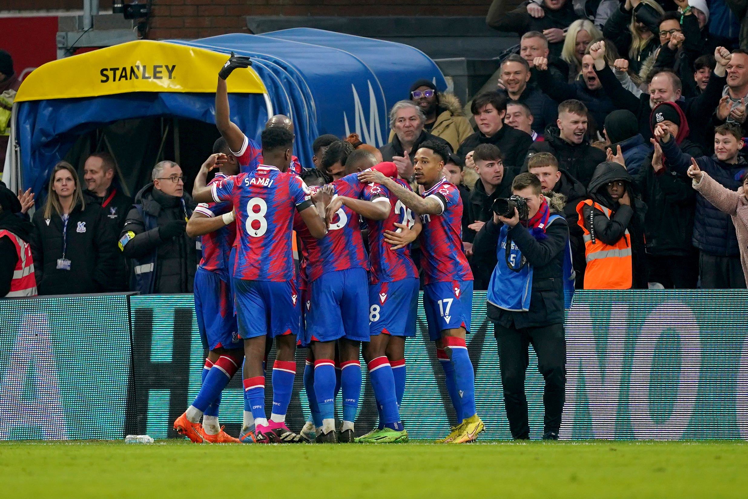 James Tomkins celebrates his equaliser for Crystal Palace against Brighton (Yui Mok/PA)