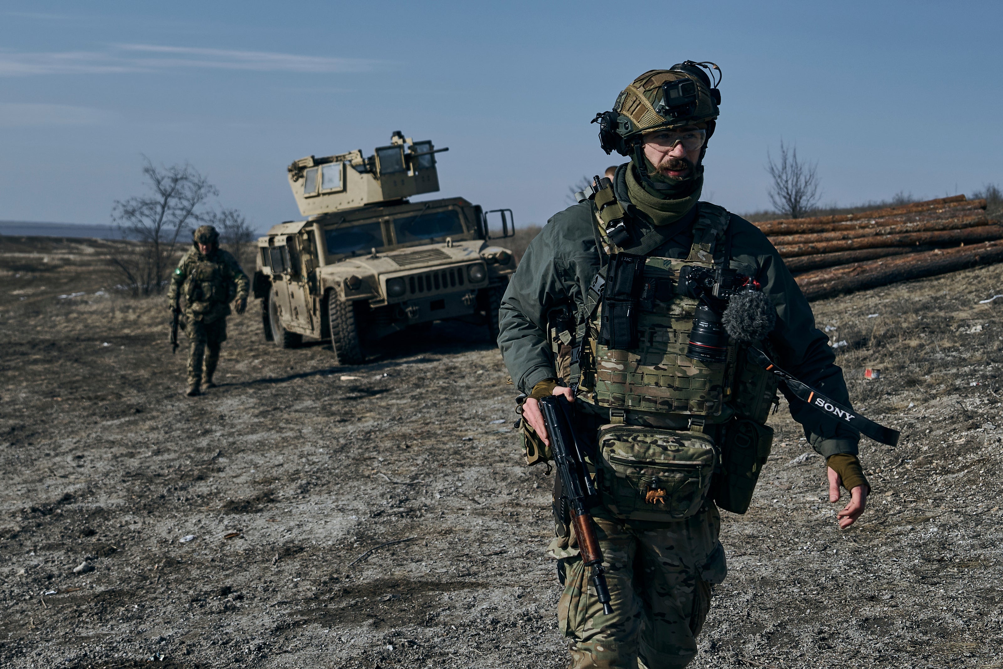 Soldiers of the Ukrainian Azov regiment near their armoured US Hummer vehicle near Bakhmut, Donetsk