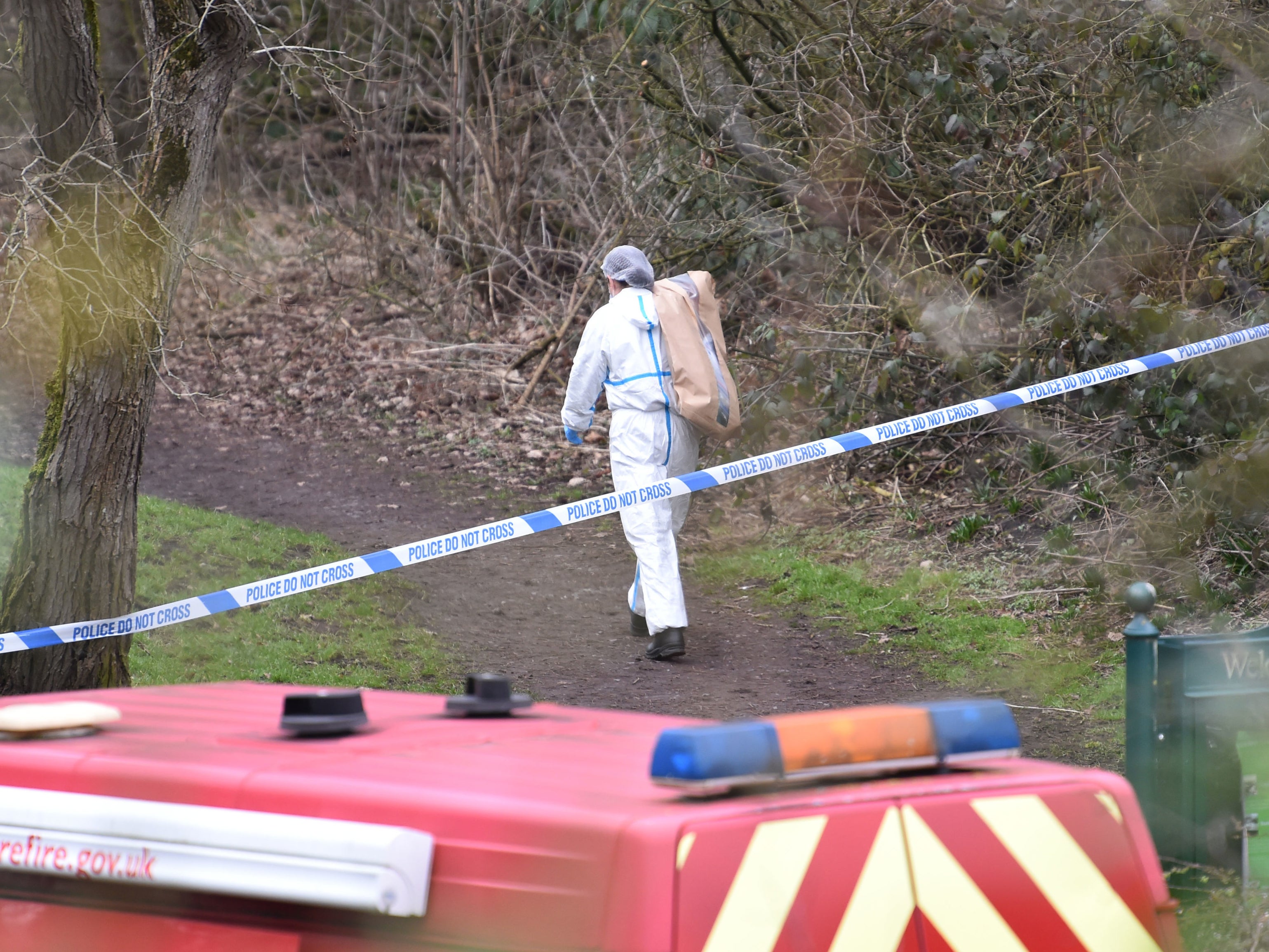 A police forensics officer at the scene in Culcheth Linear Park