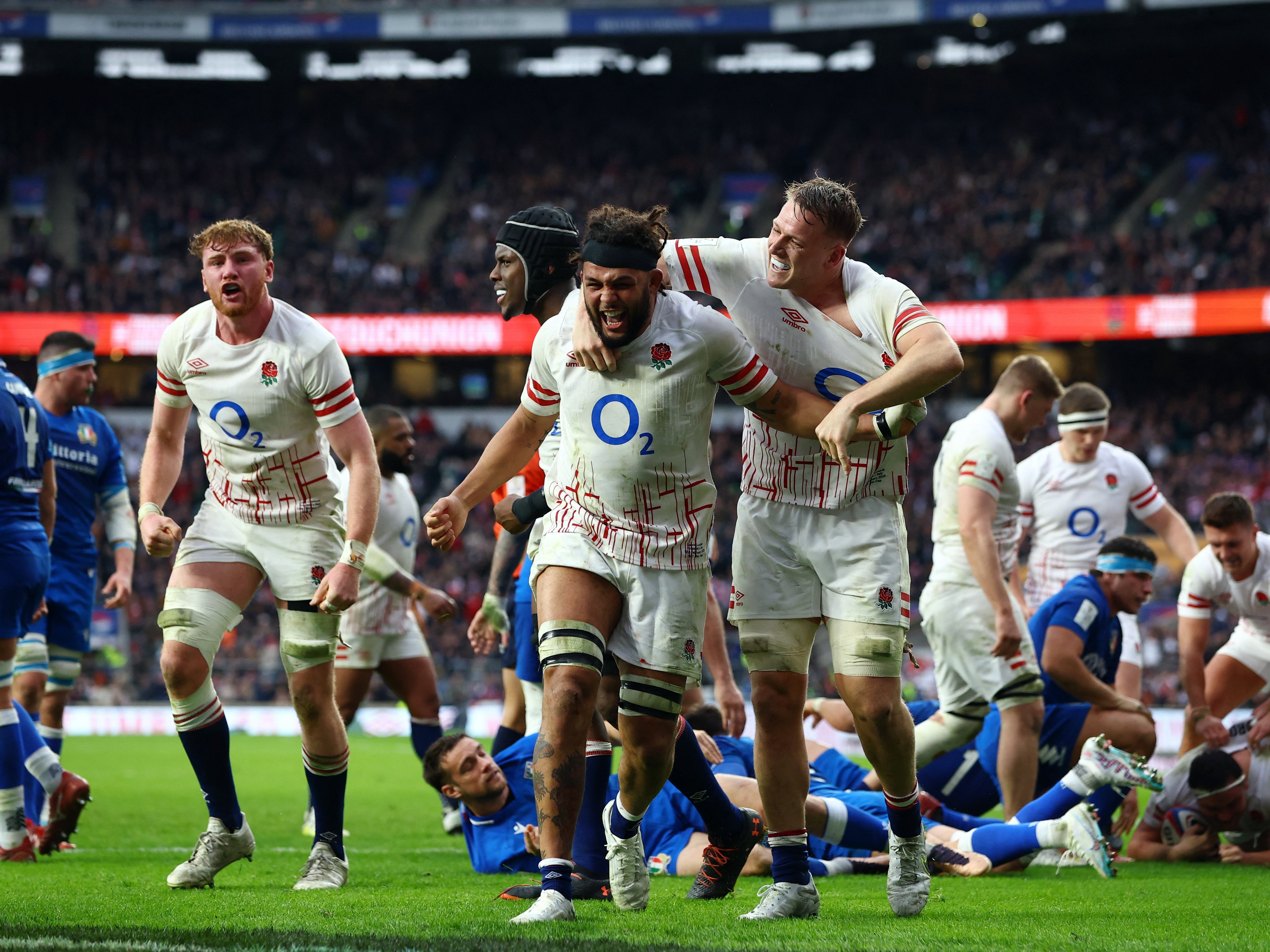 Lewis Ludlam and Alex Dombrandt celebrate a try scored by Jamie George