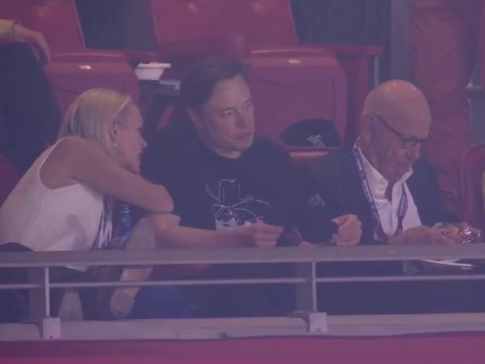 Elisabeth Murdoch, Elon Musk, and Rupert Murdoch sitting together at the 2023 Super Bowl