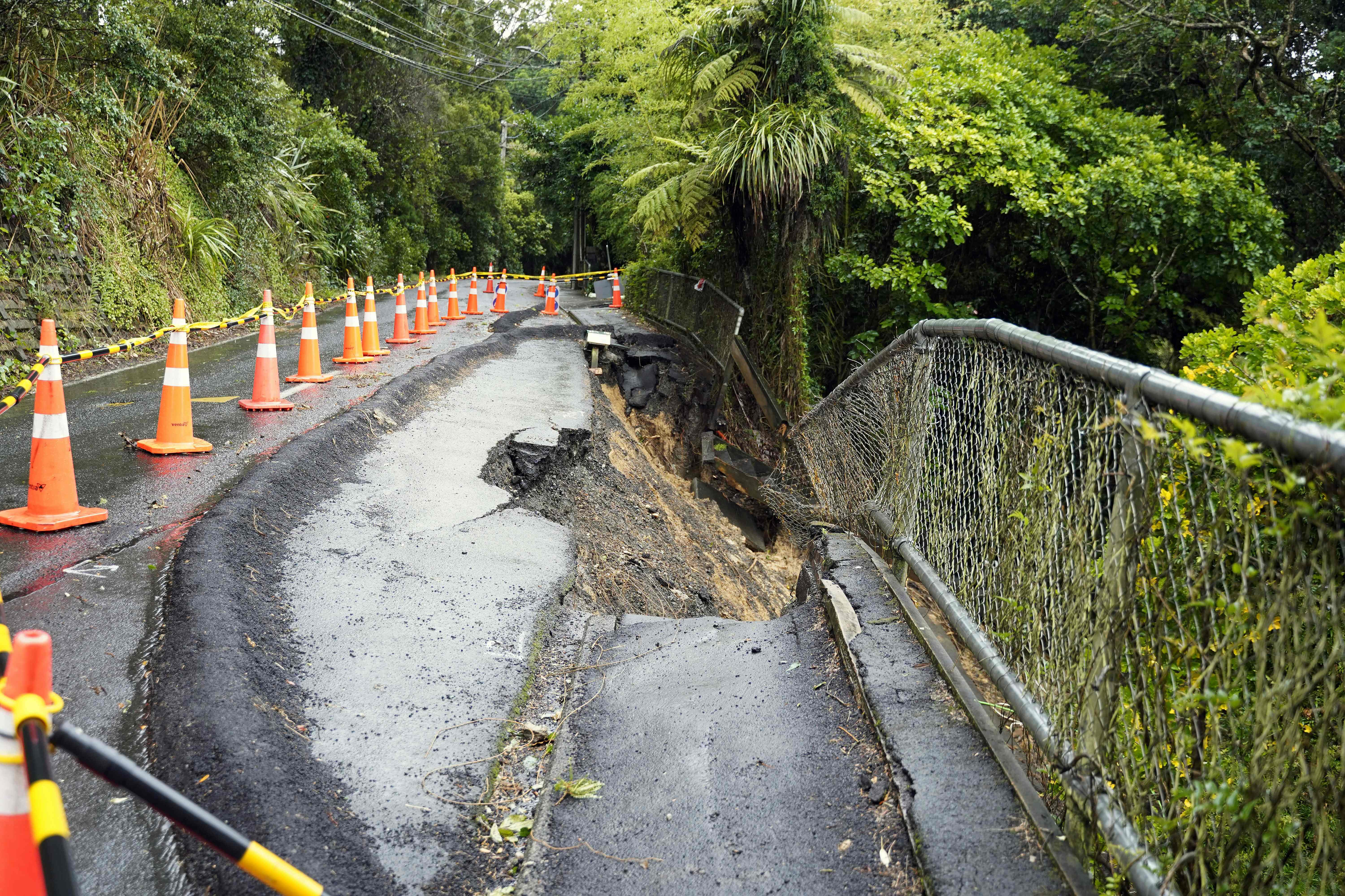 A general view of a damaged road after a storm battered Titirangi, a suburb of New Zealand's West Auckland area