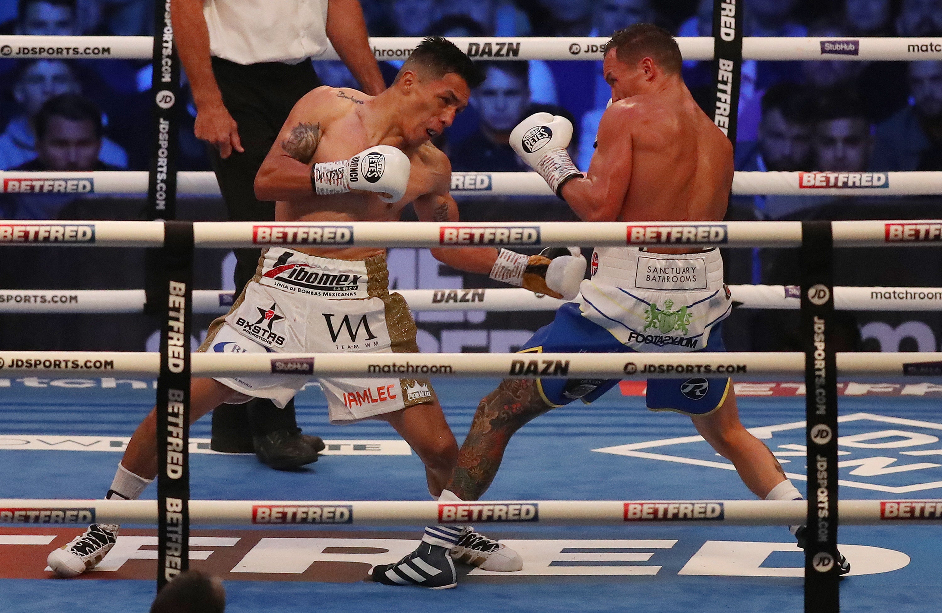 Lara stopped Josh Warrington in their first fight before their rematch (above) ended with a clash of heads