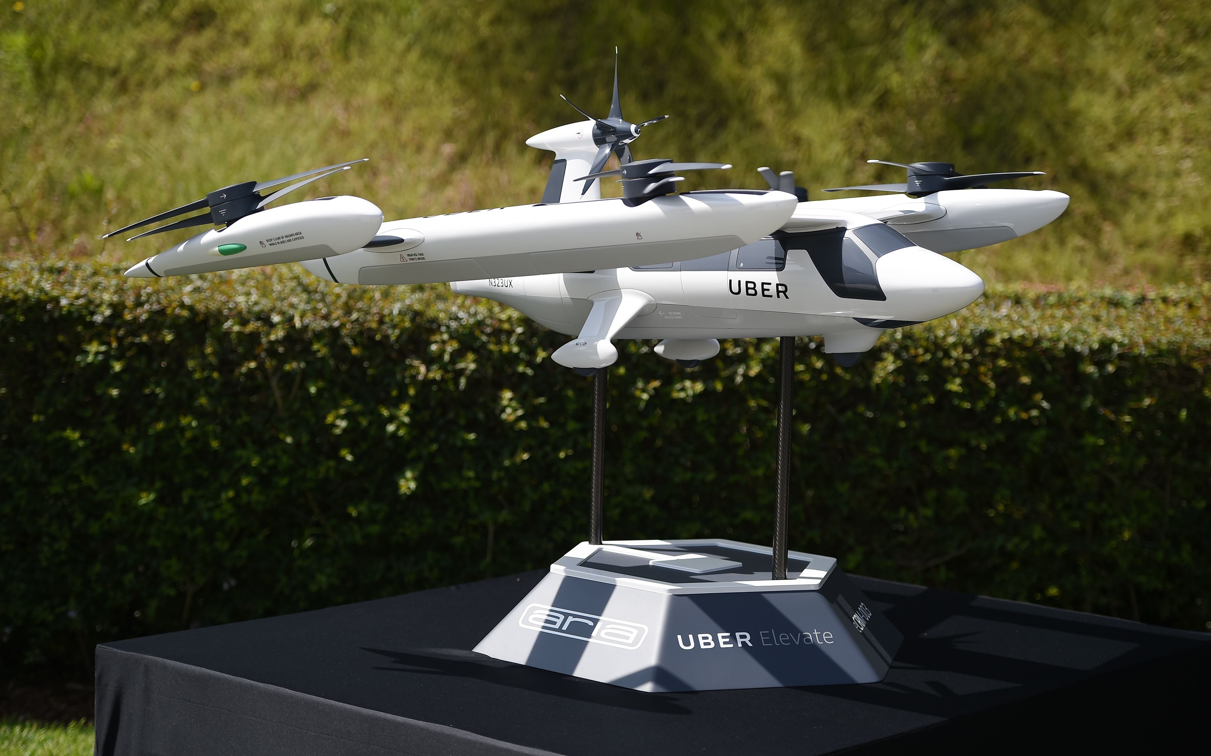 A model of Uber’s electric vertical take-off and landing vehicle concept (eVTOL) flying taxi