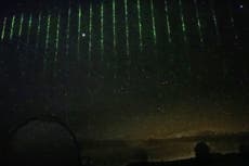 Chinese satellite fires green laser beams over Hawaii as tensions escalate over spy balloon
